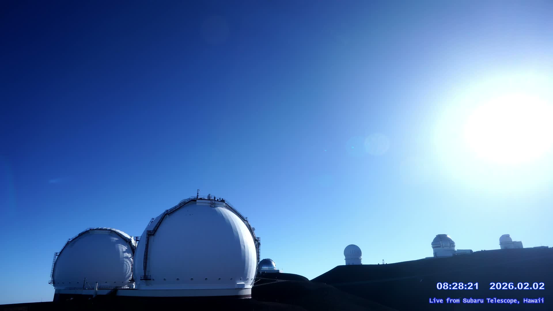 Hawaii , Mauna Kea Volcano & Observatories Center ( Subaru Telescope of  National Astronomical Observatory of Japan)  towards East Live Cam - Mauna Kea Access Road, Hilo,  Big Island, Hawaii, USA