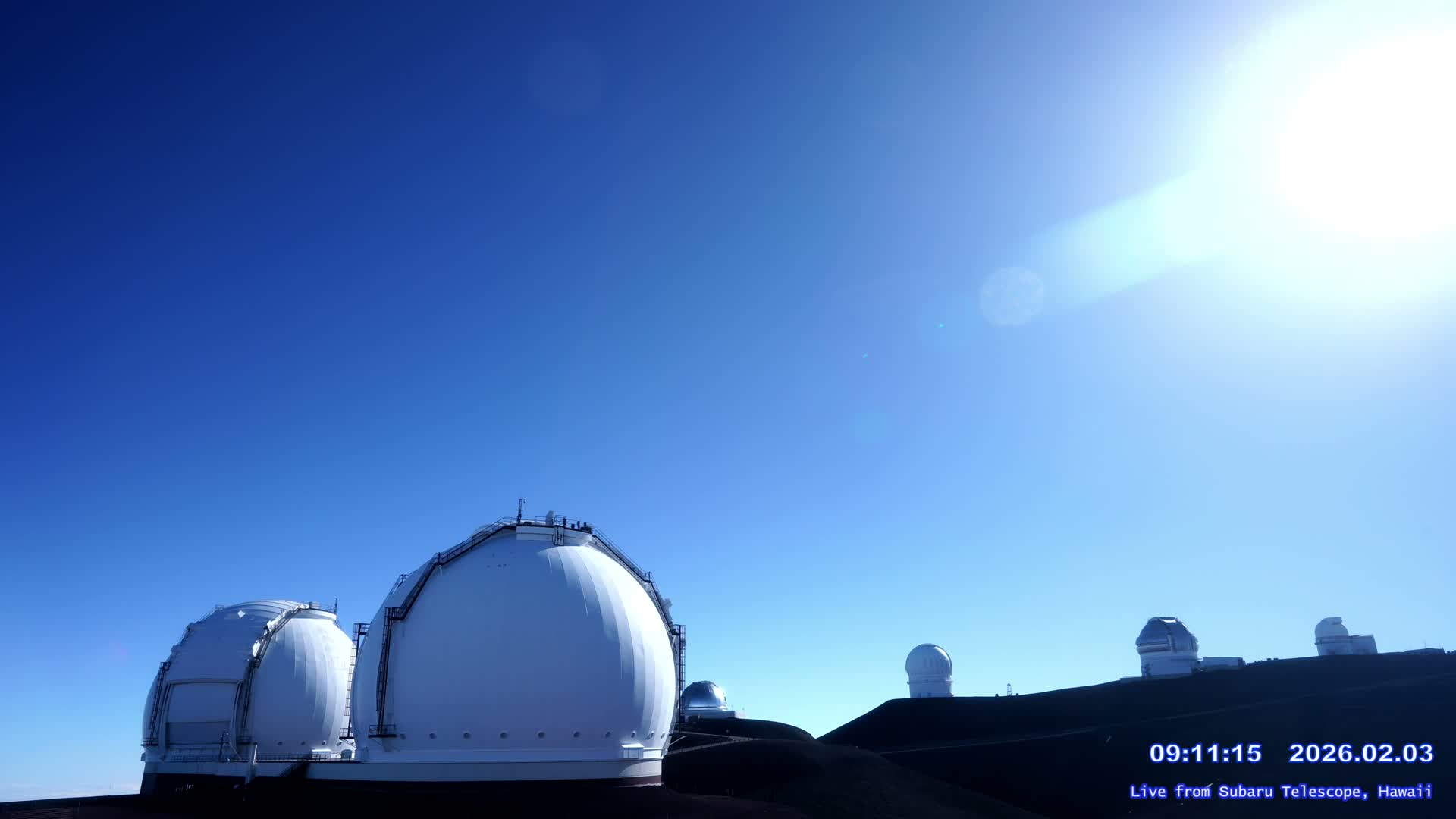 Hawaii , Mauna Kea Volcano & Observatories Center ( Subaru Telescope of  National Astronomical Observatory of Japan)  towards East Live Cam - Mauna Kea Access Road, Hilo,  Big Island, Hawaii, USA