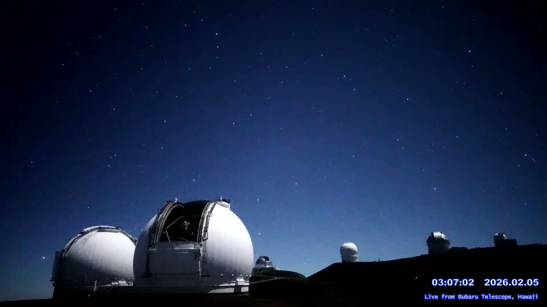 Hawaii , Mauna Kea Volcano & Observatories Center ( Subaru Telescope of  National Astronomical Observatory of Japan)  towards East Live Cam - Mauna Kea Access Road, Hilo,  Big Island, Hawaii, USA