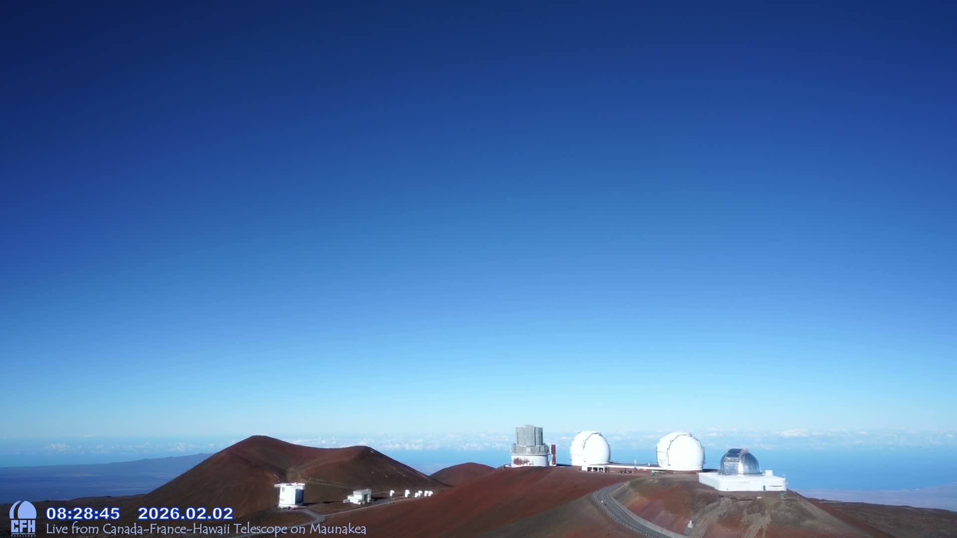 Hawaii , Mauna Kea Volcano & Observatories Center  towards West Live Cam - Mauna Kea Access Road, Hilo, Big Island, Hawaii, USA