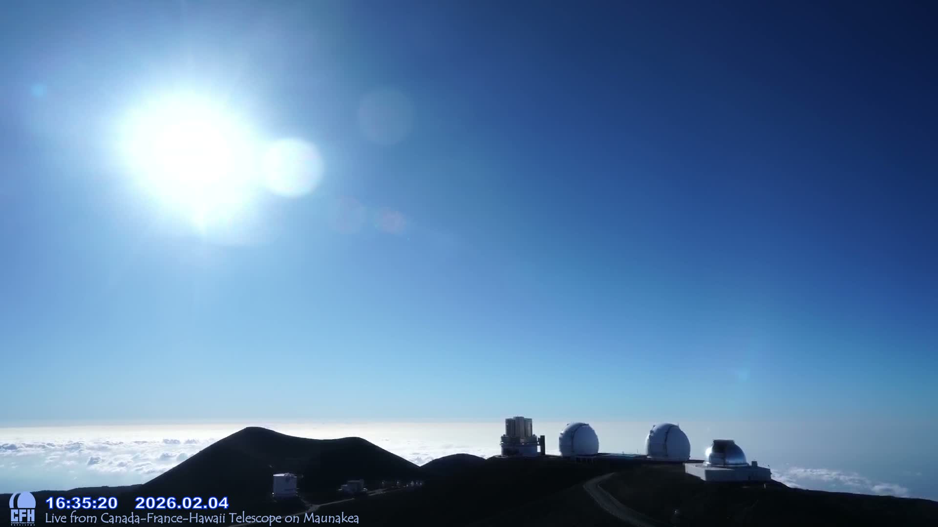 Hawaii , Mauna Kea Volcano & Observatories Center  towards West Live Cam - Mauna Kea Access Road, Hilo, Big Island, Hawaii, USA