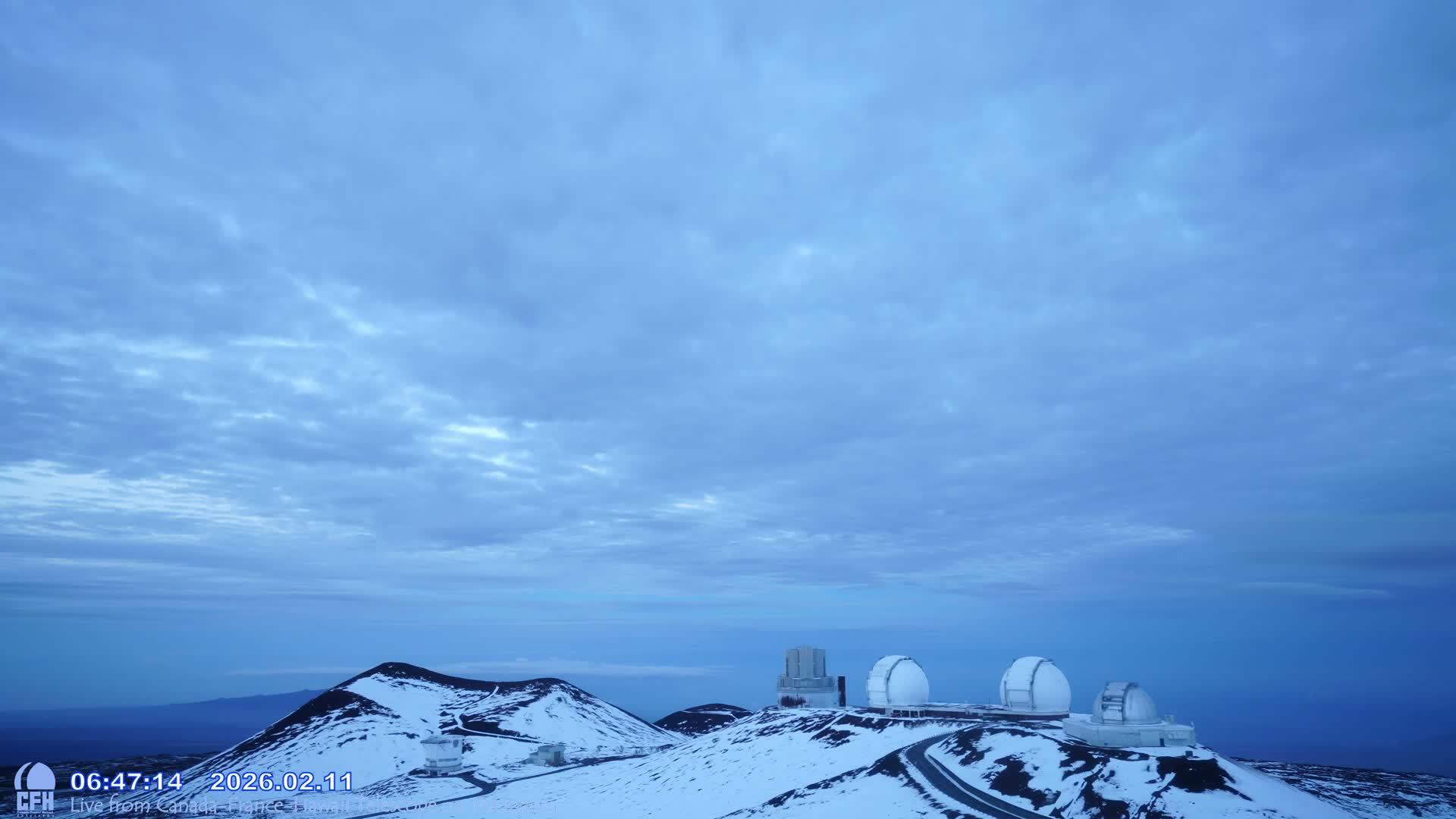 Hawaii , Mauna Kea Volcano & Observatories Center  towards West Live Cam - Mauna Kea Access Road, Hilo, Big Island, Hawaii, USA