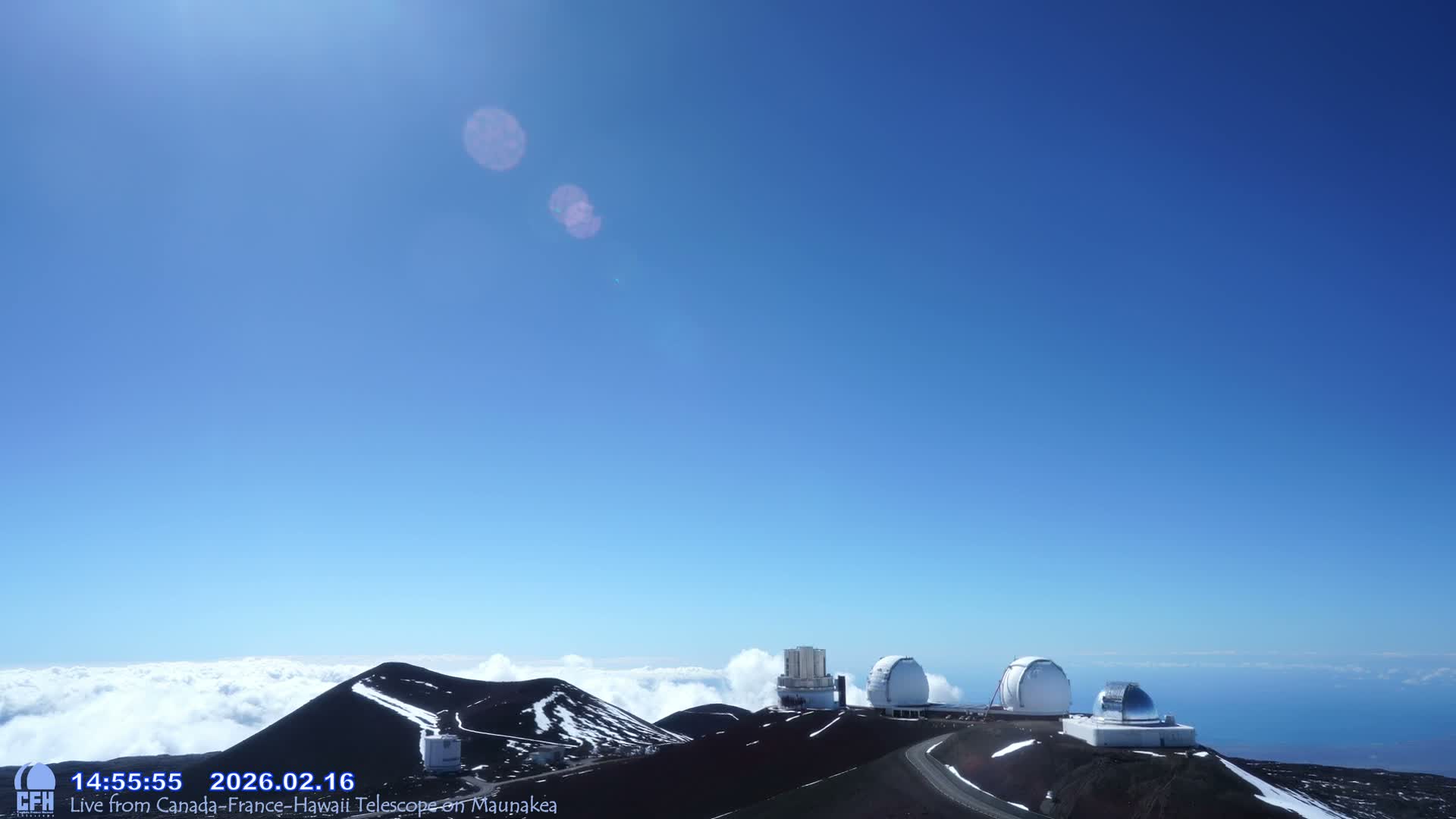 Hawaii , Mauna Kea Volcano & Observatories Center  towards West Live Cam - Mauna Kea Access Road, Hilo, Big Island, Hawaii, USA