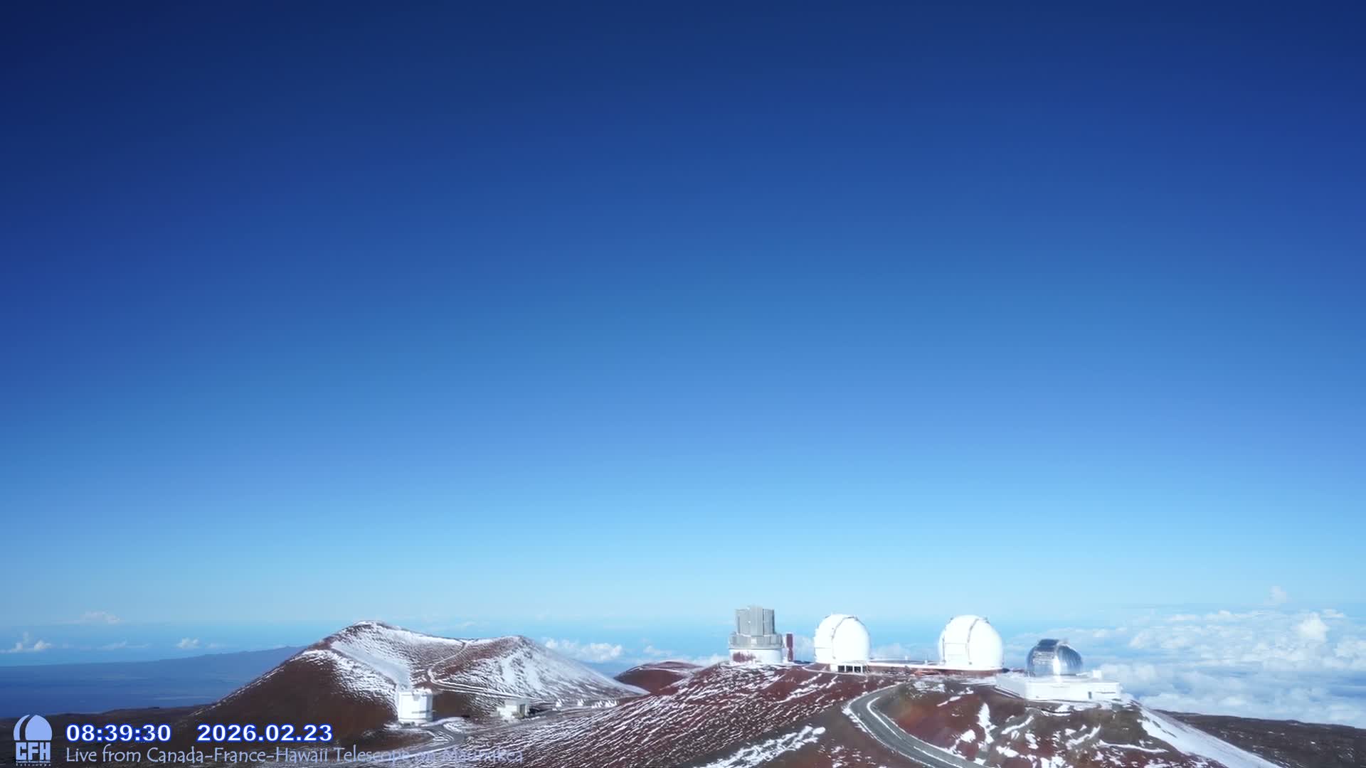 Hawaii , Mauna Kea Volcano & Observatories Center  towards West Live Cam - Mauna Kea Access Road, Hilo, Big Island, Hawaii, USA