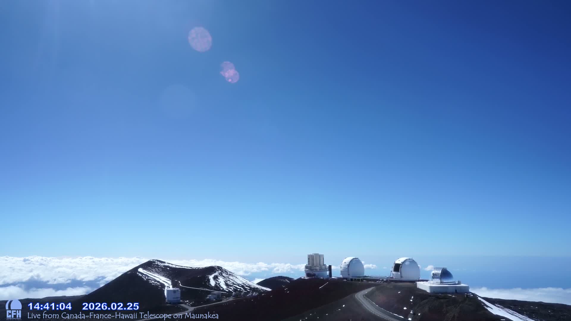 Hawaii , Mauna Kea Volcano & Observatories Center  towards West Live Cam - Mauna Kea Access Road, Hilo, Big Island, Hawaii, USA