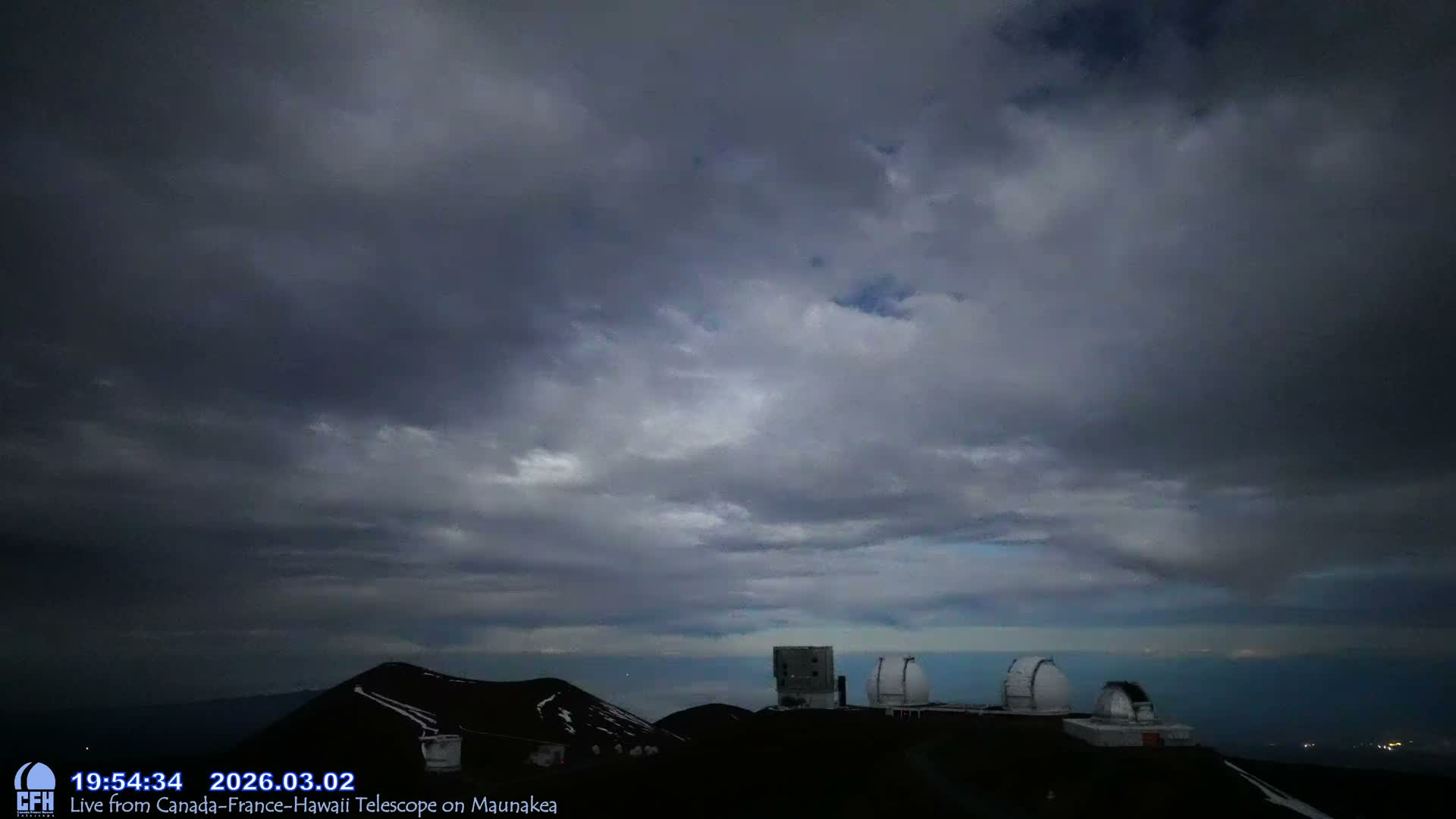 Hawaii , Mauna Kea Volcano & Observatories Center  towards West Live Cam - Mauna Kea Access Road, Hilo, Big Island, Hawaii, USA