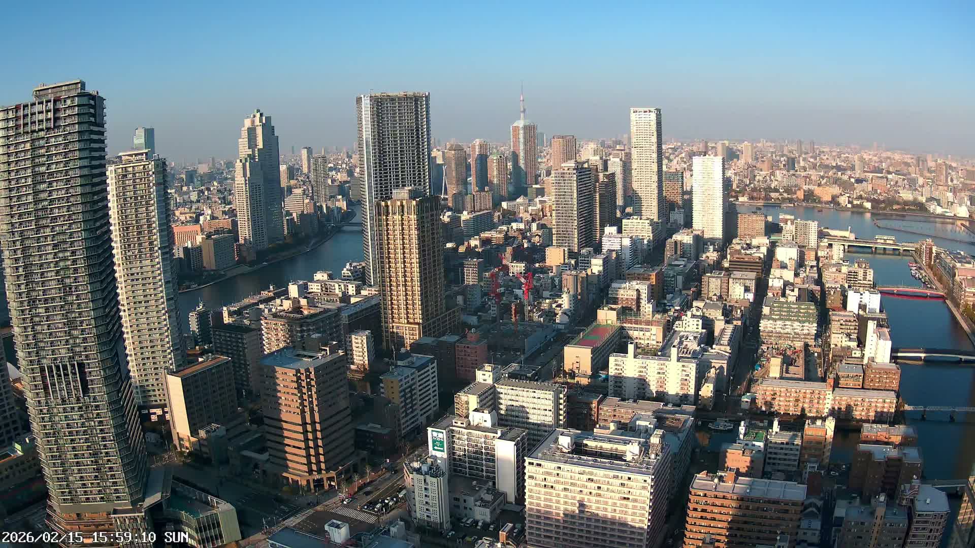 Tokyo, Kachidoki, Sumida River & Tokyo Downtown Skyline towards North View from Kachidoki ( 東京、勝どき、隅田川、北に向かう東京の下町のスカイライン 勝どきからの眺め )Live Cam - 4 Chome, Kachidoki, Chuo ku, Tokyo, Kantō, Honshu, Japan