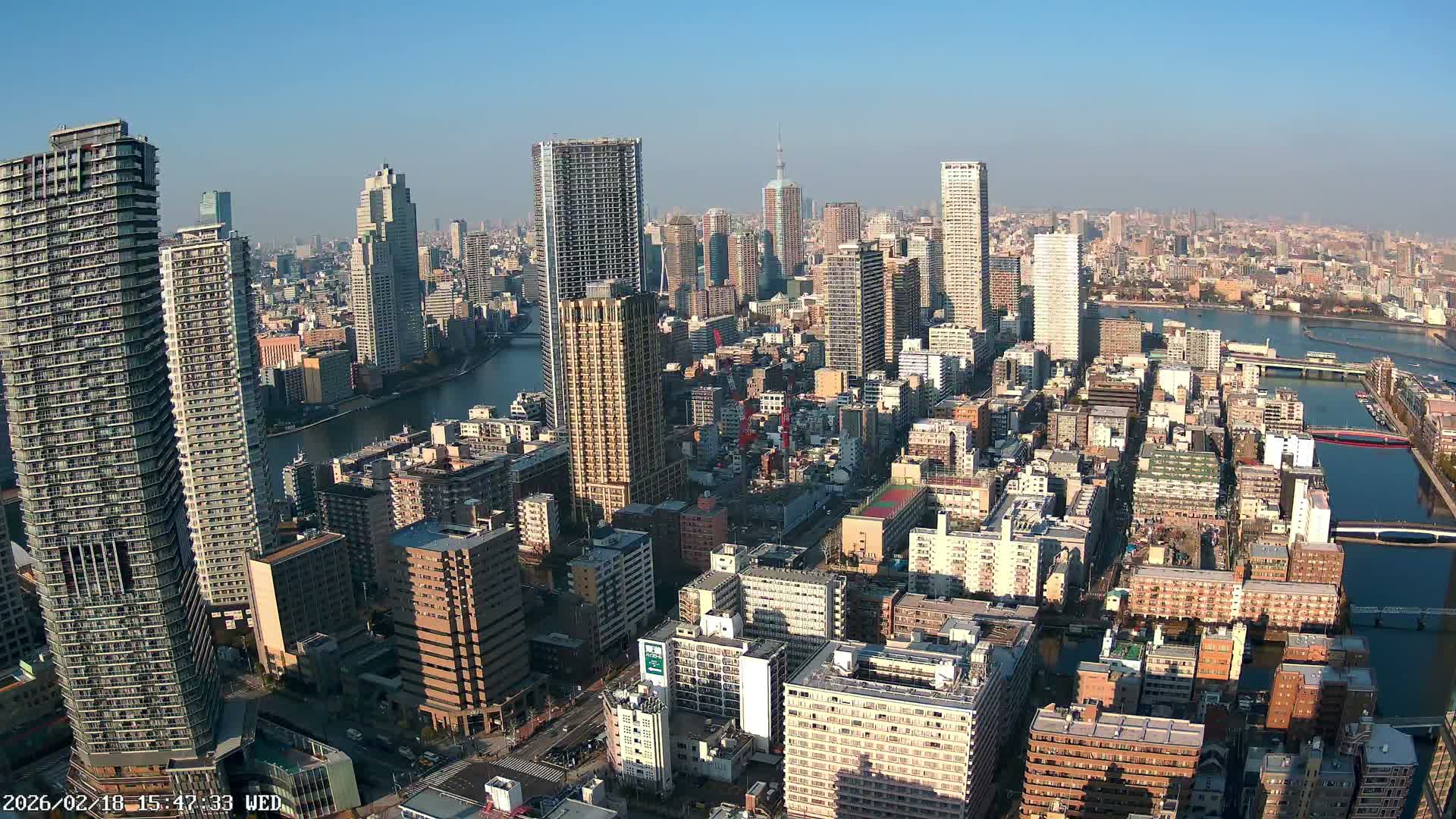 Tokyo, Kachidoki, Sumida River & Tokyo Downtown Skyline towards North View from Kachidoki ( 東京、勝どき、隅田川、北に向かう東京の下町のスカイライン 勝どきからの眺め )Live Cam - 4 Chome, Kachidoki, Chuo ku, Tokyo, Kantō, Honshu, Japan