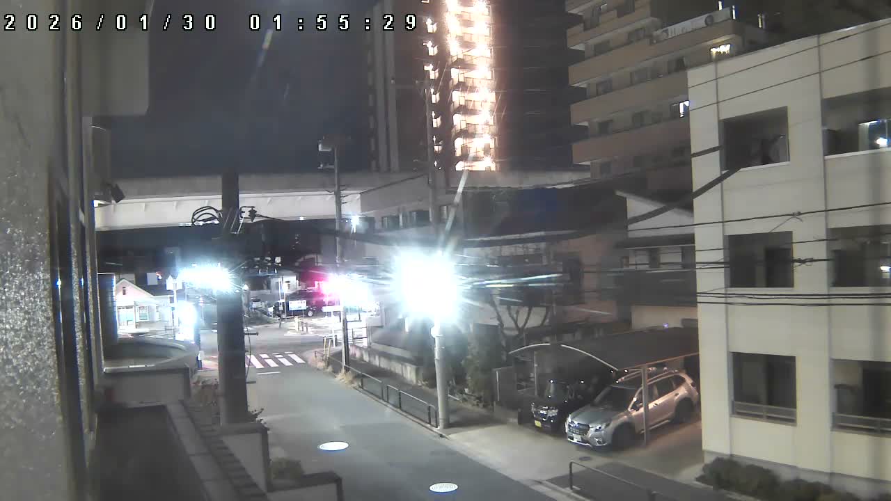 Tokyo, Yazaike, Ogubashi-Dori Avenue / Yazaike 3  Intersection & Nippori Toneri Liner 3. km Viaduct towrads South  ( 東京・谷在家・尾久橋通り / 谷在家3交差点＆日暮里舎人ライナー高架橋 ) Live Cam -  1 Chome, Yazaike, Adachi-ku, Tokyo, Kanto, Honshu, Japan