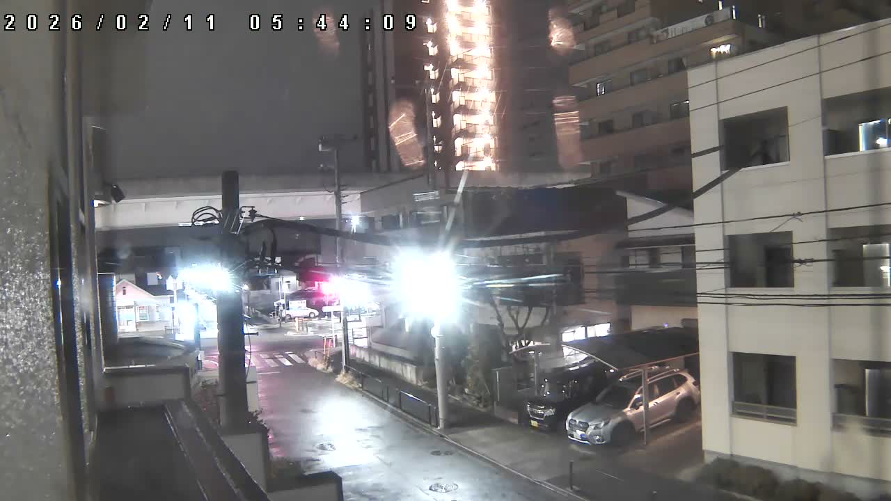 Tokyo, Yazaike, Ogubashi-Dori Avenue / Yazaike 3  Intersection & Nippori Toneri Liner 3. km Viaduct towrads South  ( 東京・谷在家・尾久橋通り / 谷在家3交差点＆日暮里舎人ライナー高架橋 ) Live Cam -  1 Chome, Yazaike, Adachi-ku, Tokyo, Kanto, Honshu, Japan