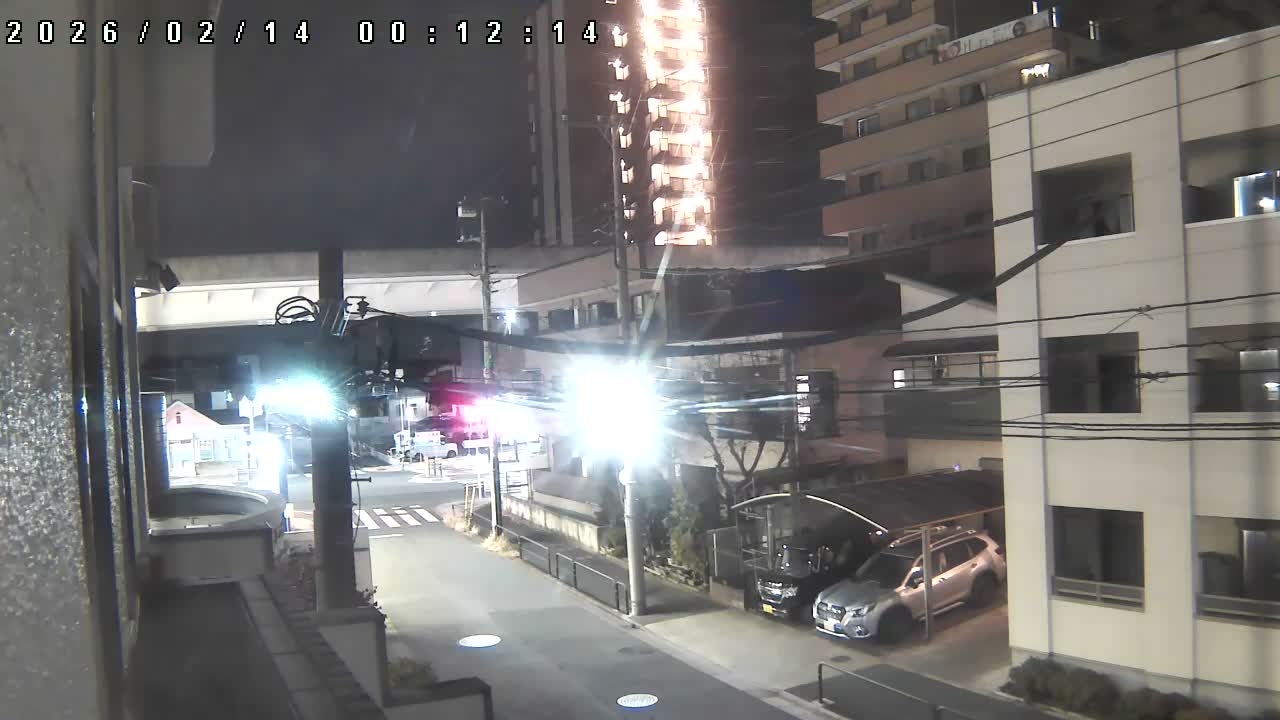 Tokyo, Yazaike, Ogubashi-Dori Avenue / Yazaike 3  Intersection & Nippori Toneri Liner 3. km Viaduct towrads South  ( 東京・谷在家・尾久橋通り / 谷在家3交差点＆日暮里舎人ライナー高架橋 ) Live Cam -  1 Chome, Yazaike, Adachi-ku, Tokyo, Kanto, Honshu, Japan