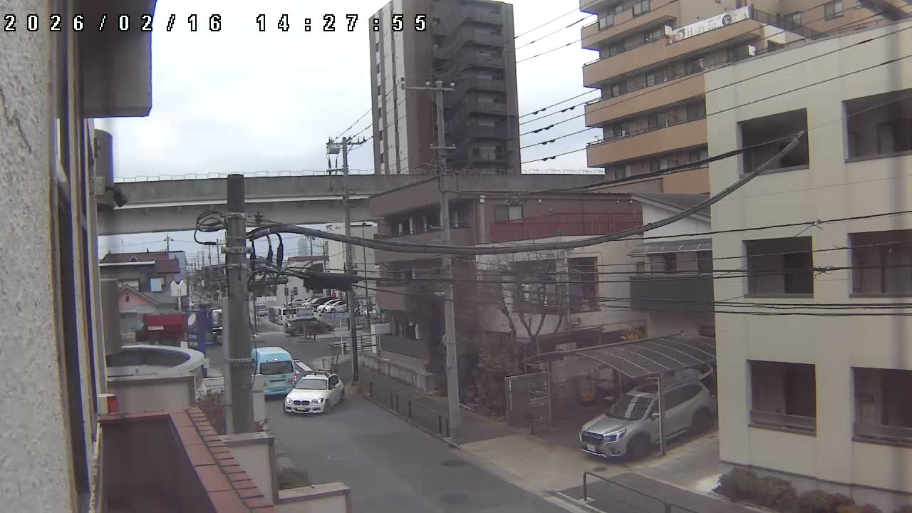 Tokyo, Yazaike, Ogubashi-Dori Avenue / Yazaike 3  Intersection & Nippori Toneri Liner 3. km Viaduct towrads South  ( 東京・谷在家・尾久橋通り / 谷在家3交差点＆日暮里舎人ライナー高架橋 ) Live Cam -  1 Chome, Yazaike, Adachi-ku, Tokyo, Kanto, Honshu, Japan