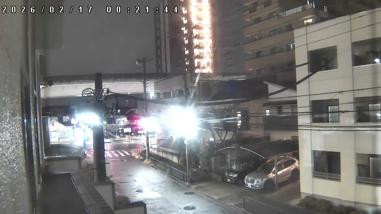Tokyo, Yazaike, Ogubashi-Dori Avenue / Yazaike 3  Intersection & Nippori Toneri Liner 3. km Viaduct towrads South  ( 東京・谷在家・尾久橋通り / 谷在家3交差点＆日暮里舎人ライナー高架橋 ) Live Cam -  1 Chome, Yazaike, Adachi-ku, Tokyo, Kanto, Honshu, Japan