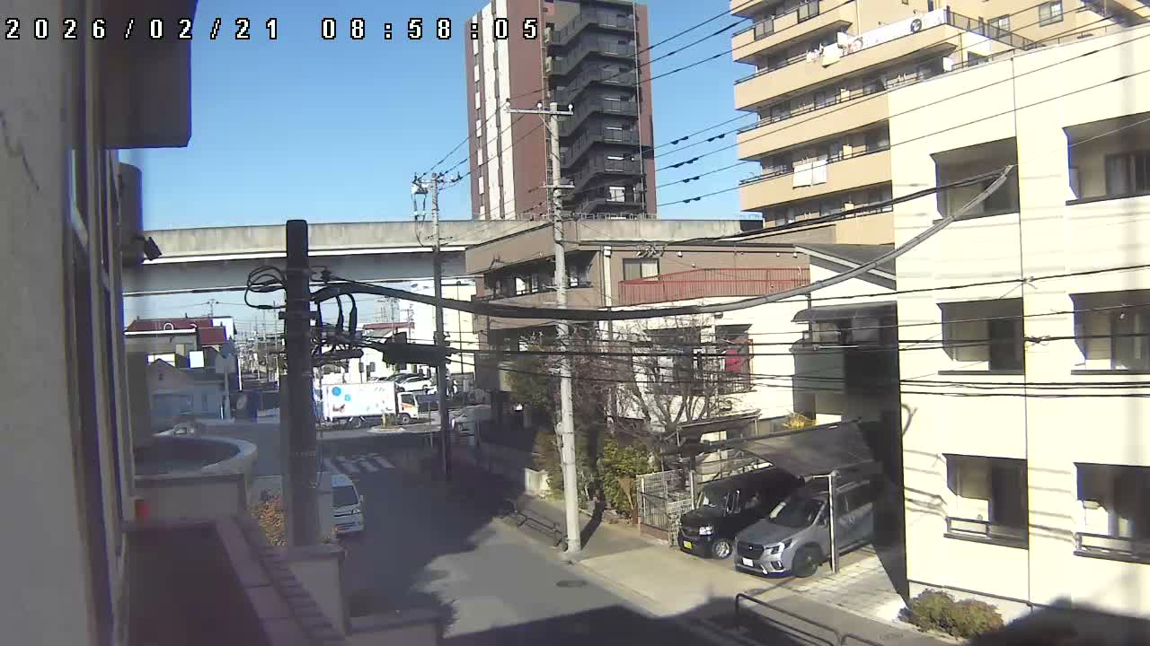 Tokyo, Yazaike, Ogubashi-Dori Avenue / Yazaike 3  Intersection & Nippori Toneri Liner 3. km Viaduct towrads South  ( 東京・谷在家・尾久橋通り / 谷在家3交差点＆日暮里舎人ライナー高架橋 ) Live Cam -  1 Chome, Yazaike, Adachi-ku, Tokyo, Kanto, Honshu, Japan