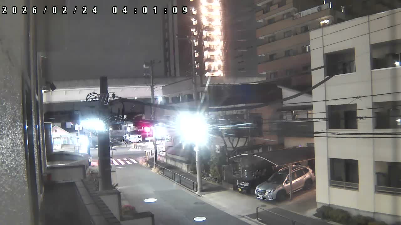 Tokyo, Yazaike, Ogubashi-Dori Avenue / Yazaike 3  Intersection & Nippori Toneri Liner 3. km Viaduct towrads South  ( 東京・谷在家・尾久橋通り / 谷在家3交差点＆日暮里舎人ライナー高架橋 ) Live Cam -  1 Chome, Yazaike, Adachi-ku, Tokyo, Kanto, Honshu, Japan