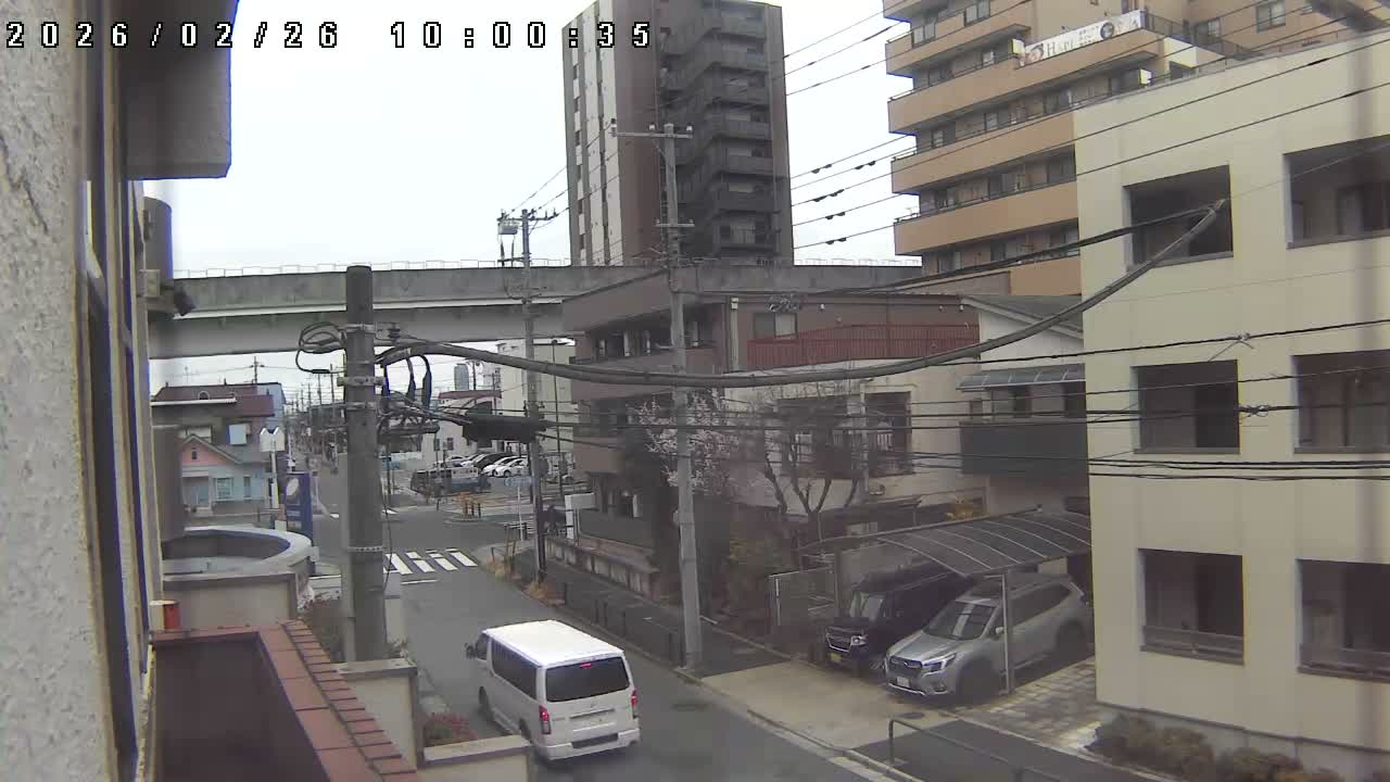 Tokyo, Yazaike, Ogubashi-Dori Avenue / Yazaike 3  Intersection & Nippori Toneri Liner 3. km Viaduct towrads South  ( 東京・谷在家・尾久橋通り / 谷在家3交差点＆日暮里舎人ライナー高架橋 ) Live Cam -  1 Chome, Yazaike, Adachi-ku, Tokyo, Kanto, Honshu, Japan