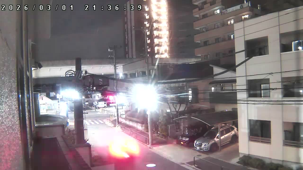 Tokyo, Yazaike, Ogubashi-Dori Avenue / Yazaike 3  Intersection & Nippori Toneri Liner 3. km Viaduct towrads South  ( 東京・谷在家・尾久橋通り / 谷在家3交差点＆日暮里舎人ライナー高架橋 ) Live Cam -  1 Chome, Yazaike, Adachi-ku, Tokyo, Kanto, Honshu, Japan