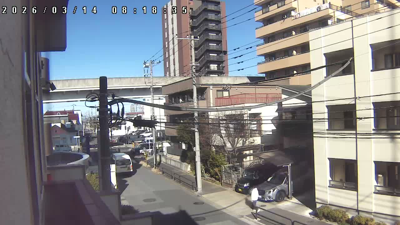 Tokyo, Yazaike, Ogubashi-Dori Avenue / Yazaike 3  Intersection & Nippori Toneri Liner 3. km Viaduct towrads South  ( 東京・谷在家・尾久橋通り / 谷在家3交差点＆日暮里舎人ライナー高架橋 ) Live Cam -  1 Chome, Yazaike, Adachi-ku, Tokyo, Kanto, Honshu, Japan