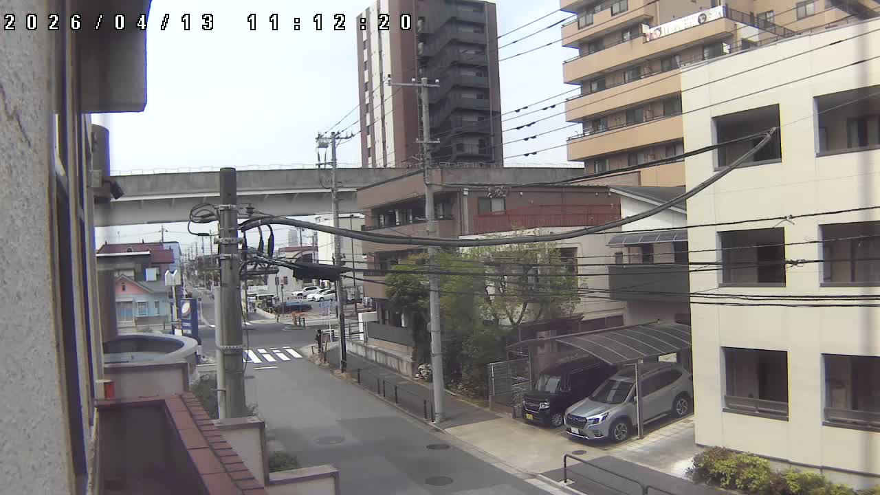 Tokyo, Yazaike, Ogubashi-Dori Avenue / Yazaike 3  Intersection & Nippori Toneri Liner 3. km Viaduct towrads South  ( 東京・谷在家・尾久橋通り / 谷在家3交差点＆日暮里舎人ライナー高架橋 ) Live Cam -  1 Chome, Yazaike, Adachi-ku, Tokyo, Kanto, Honshu, Japan