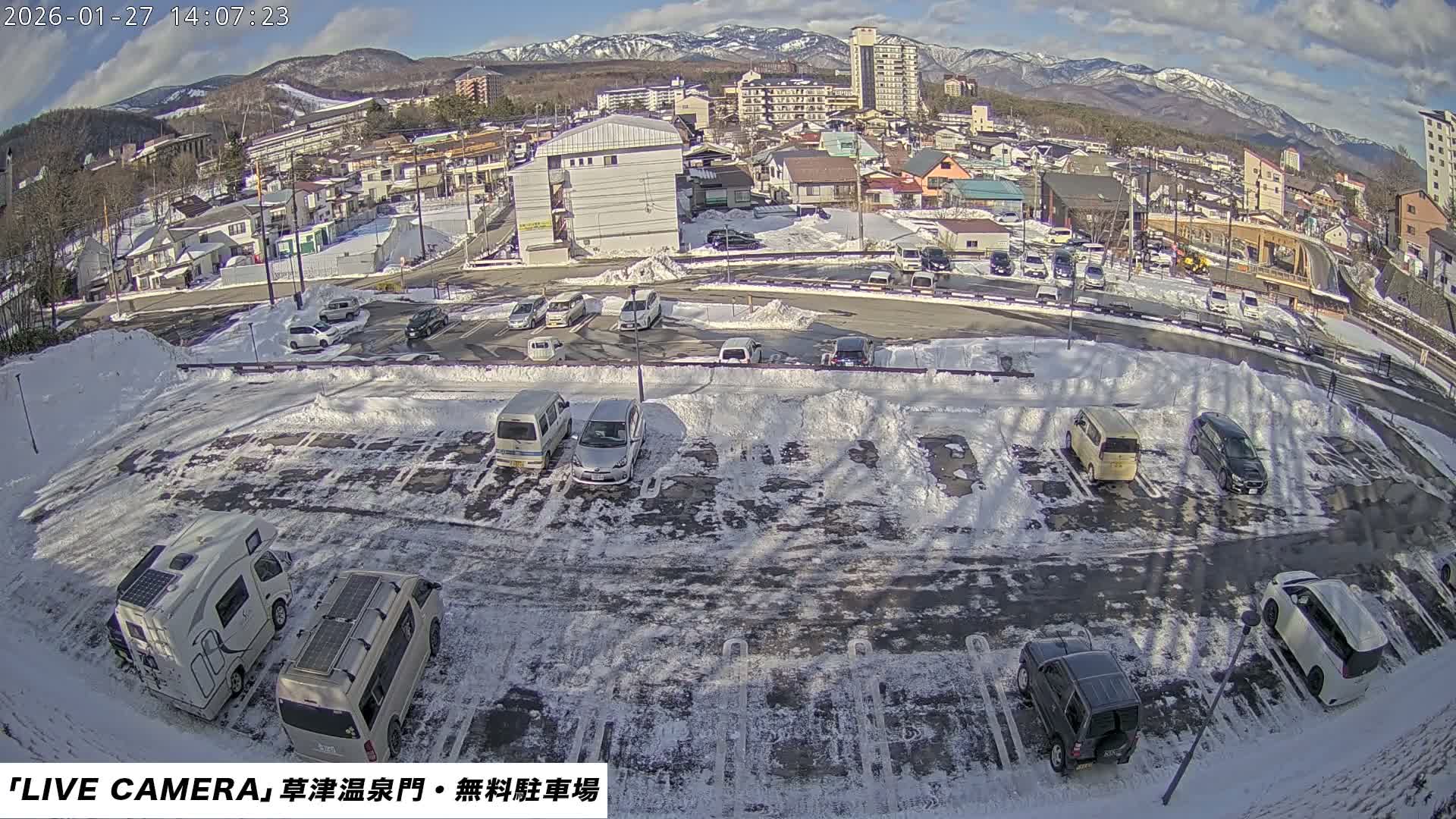 Gunma, Kusatsu Onsen Gate Car Parking Hot Spring Mon Parking Lot & Kusatsu Skyline View towards Northeast ( 群馬県草津温泉門前駐車場と北東方向の草津スカイラインの眺め ) Live Cam  - Kusatsu, Agatsuma-gun , Gunma, Kantō, Honshu, 