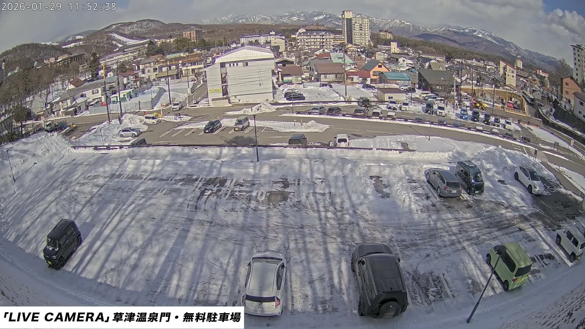 Gunma, Kusatsu Onsen Gate Car Parking Hot Spring Mon Parking Lot & Kusatsu Skyline View towards Northeast ( 群馬県草津温泉門前駐車場と北東方向の草津スカイラインの眺め ) Live Cam  - Kusatsu, Agatsuma-gun , Gunma, Kantō, Honshu, 
