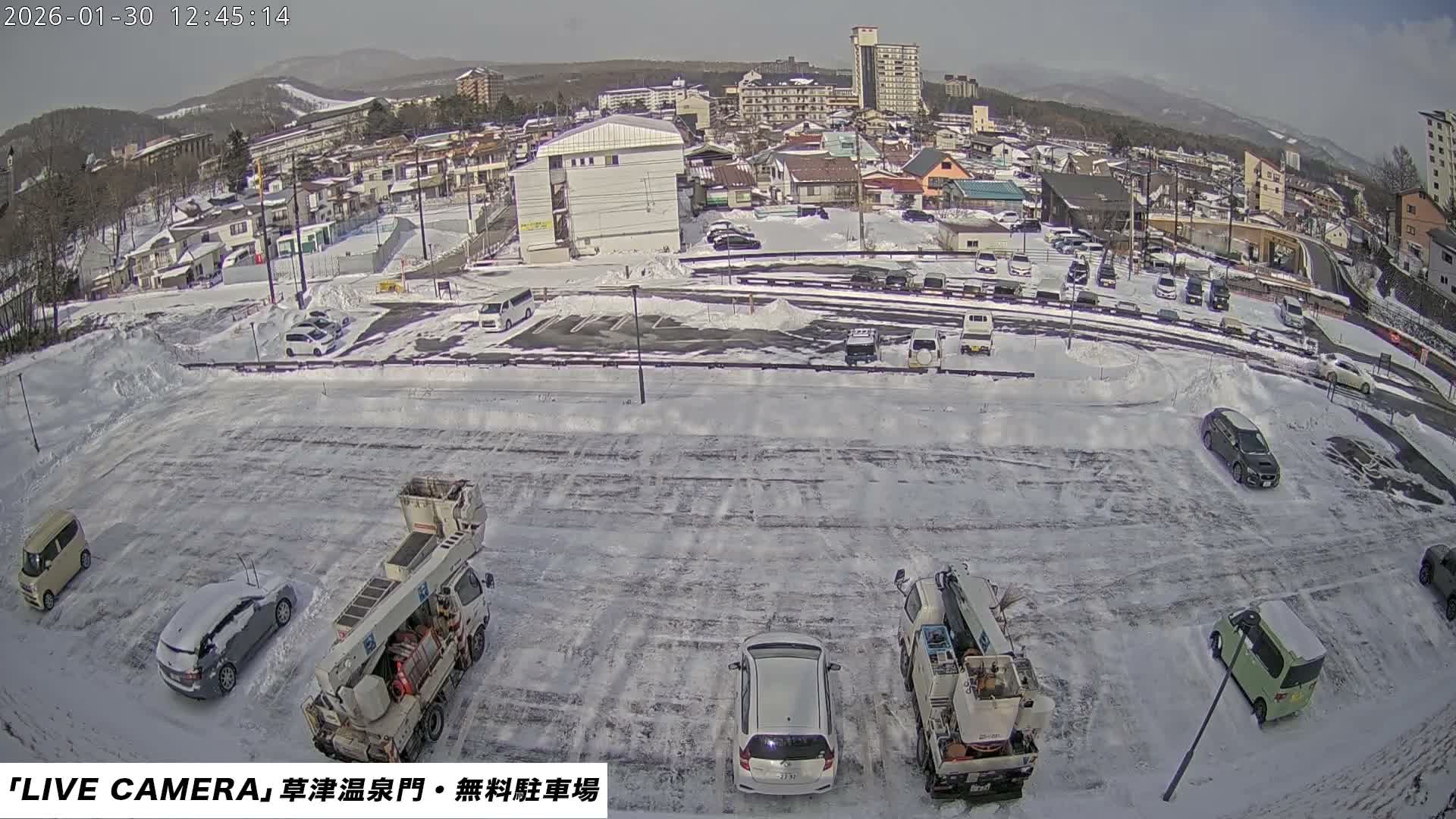 Gunma, Kusatsu Onsen Gate Car Parking Hot Spring Mon Parking Lot & Kusatsu Skyline View towards Northeast ( 群馬県草津温泉門前駐車場と北東方向の草津スカイラインの眺め ) Live Cam  - Kusatsu, Agatsuma-gun , Gunma, Kantō, Honshu, 