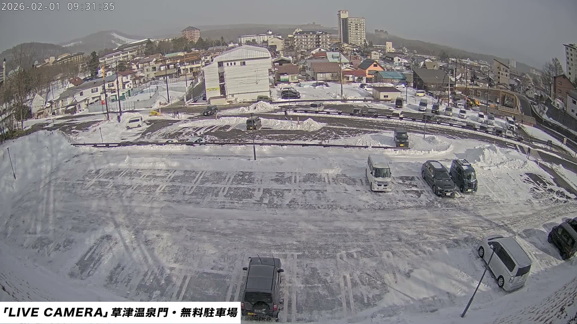 Gunma, Kusatsu Onsen Gate Car Parking Hot Spring Mon Parking Lot & Kusatsu Skyline View towards Northeast ( 群馬県草津温泉門前駐車場と北東方向の草津スカイラインの眺め ) Live Cam  - Kusatsu, Agatsuma-gun , Gunma, Kantō, Honshu, 