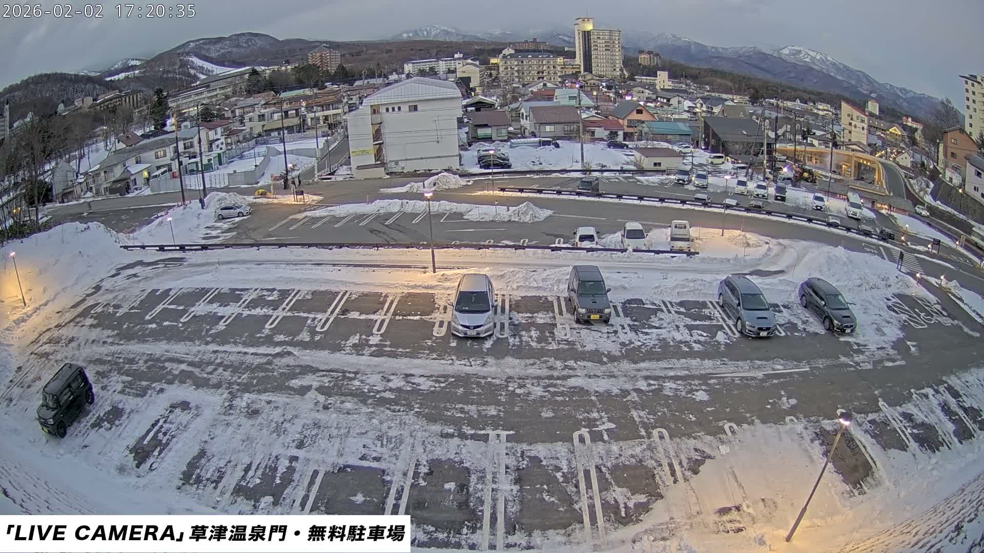 Gunma, Kusatsu Onsen Gate Car Parking Hot Spring Mon Parking Lot & Kusatsu Skyline View towards Northeast ( 群馬県草津温泉門前駐車場と北東方向の草津スカイラインの眺め ) Live Cam  - Kusatsu, Agatsuma-gun , Gunma, Kantō, Honshu, 