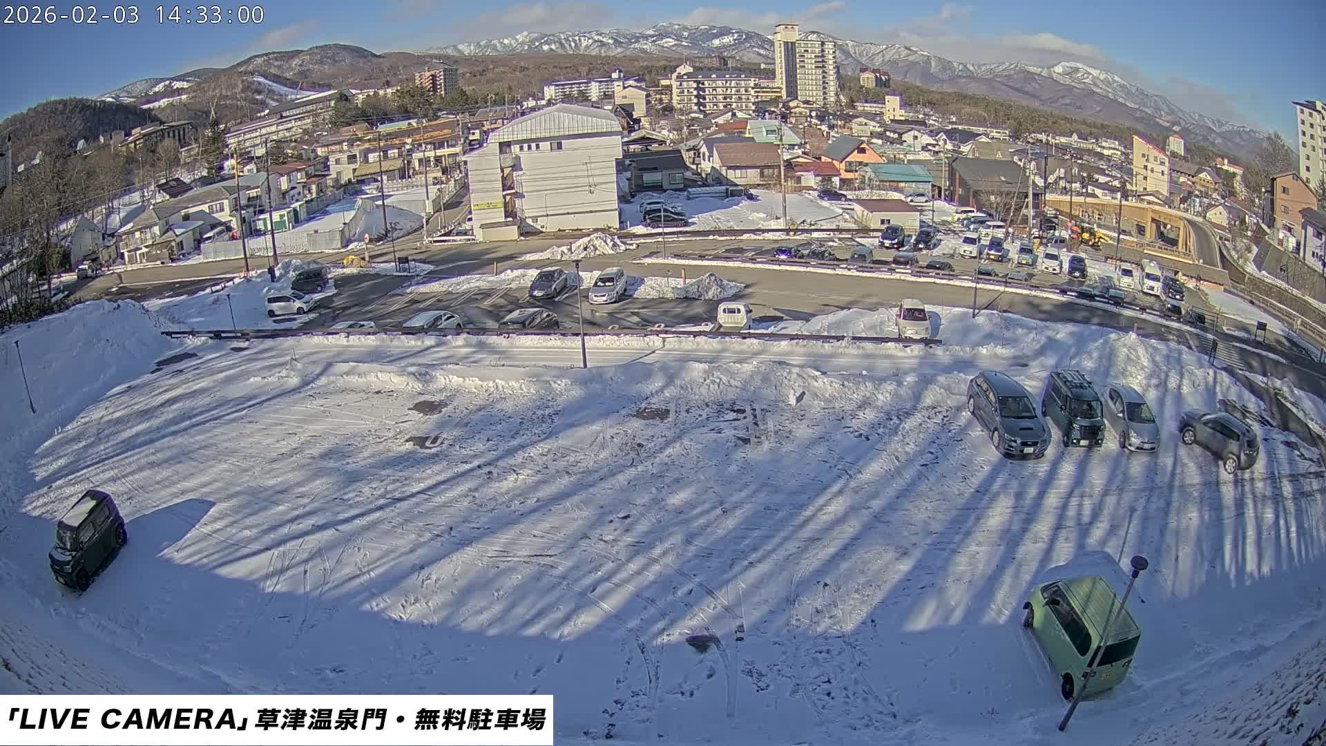 Gunma, Kusatsu Onsen Gate Car Parking Hot Spring Mon Parking Lot & Kusatsu Skyline View towards Northeast ( 群馬県草津温泉門前駐車場と北東方向の草津スカイラインの眺め ) Live Cam  - Kusatsu, Agatsuma-gun , Gunma, Kantō, Honshu, 