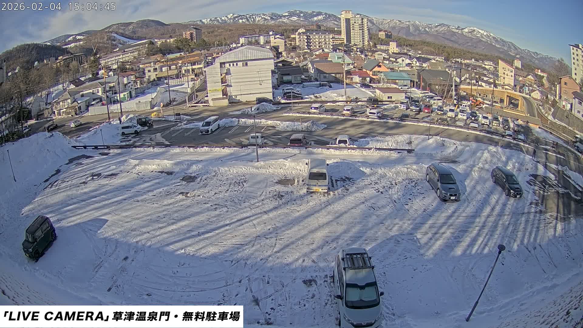 Gunma, Kusatsu Onsen Gate Car Parking Hot Spring Mon Parking Lot & Kusatsu Skyline View towards Northeast ( 群馬県草津温泉門前駐車場と北東方向の草津スカイラインの眺め ) Live Cam  - Kusatsu, Agatsuma-gun , Gunma, Kantō, Honshu, 