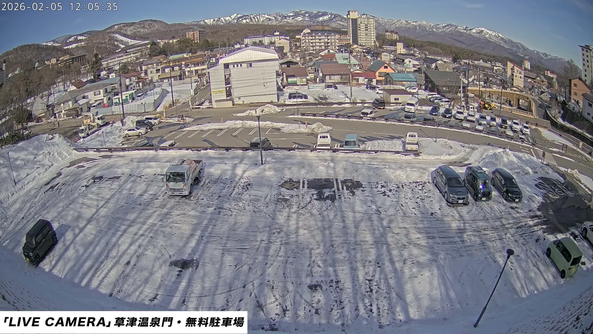Gunma, Kusatsu Onsen Gate Car Parking Hot Spring Mon Parking Lot & Kusatsu Skyline View towards Northeast ( 群馬県草津温泉門前駐車場と北東方向の草津スカイラインの眺め ) Live Cam  - Kusatsu, Agatsuma-gun , Gunma, Kantō, Honshu, 