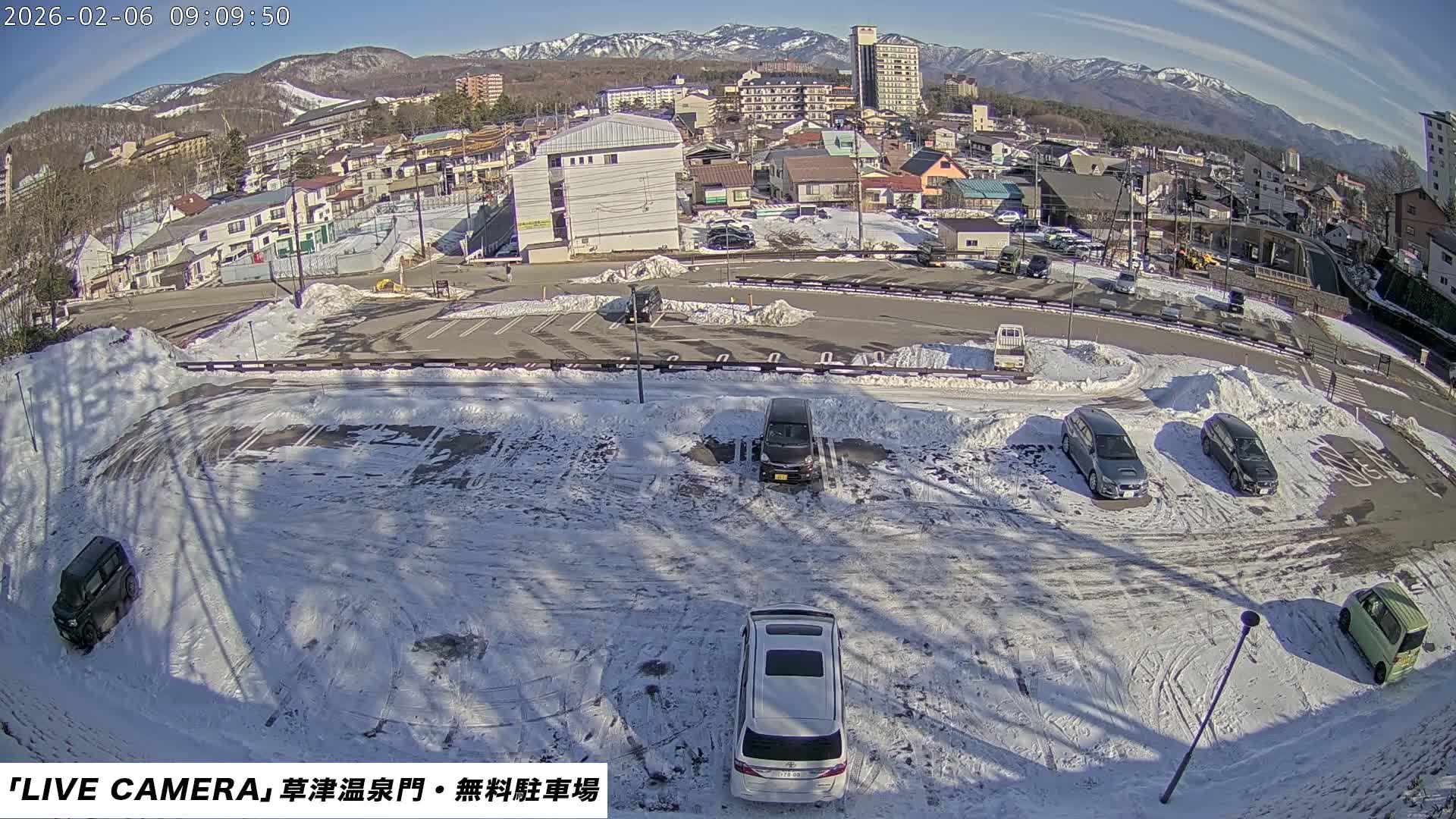 Gunma, Kusatsu Onsen Gate Car Parking Hot Spring Mon Parking Lot & Kusatsu Skyline View towards Northeast ( 群馬県草津温泉門前駐車場と北東方向の草津スカイラインの眺め ) Live Cam  - Kusatsu, Agatsuma-gun , Gunma, Kantō, Honshu, 