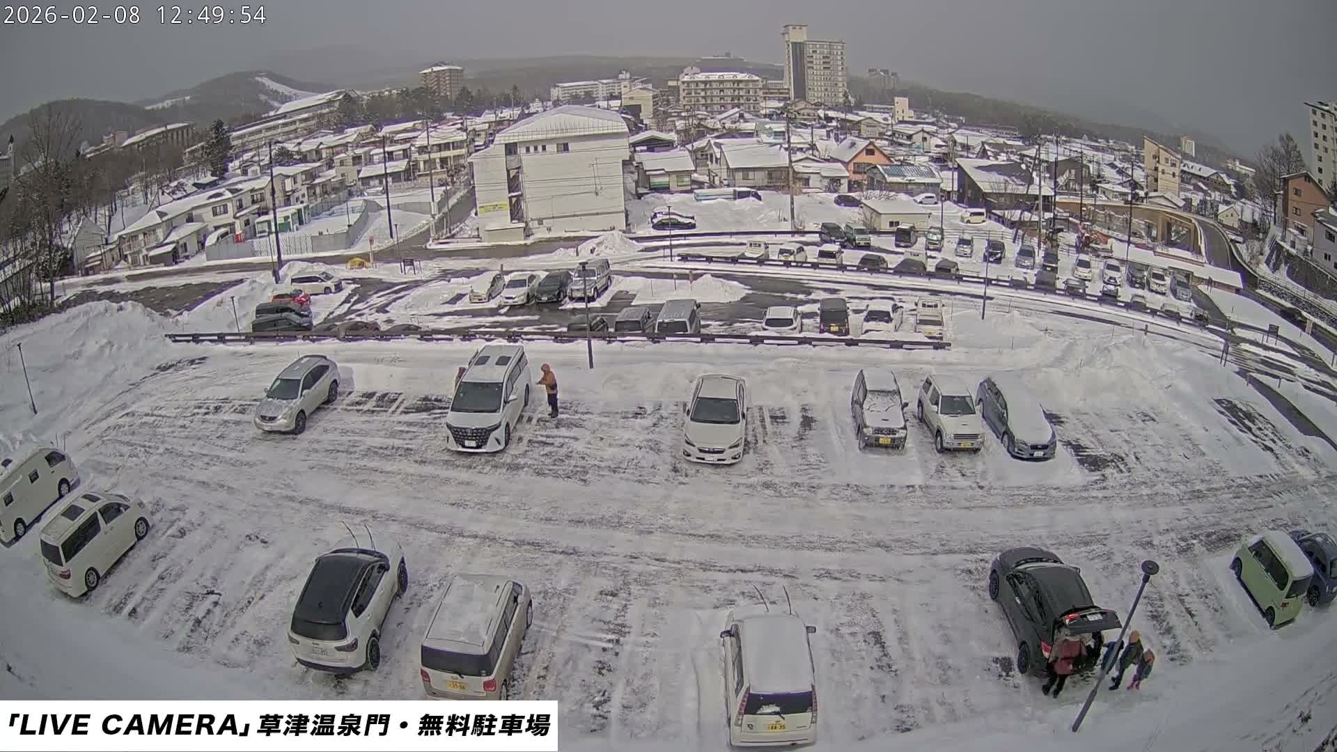 Gunma, Kusatsu Onsen Gate Car Parking Hot Spring Mon Parking Lot & Kusatsu Skyline View towards Northeast ( 群馬県草津温泉門前駐車場と北東方向の草津スカイラインの眺め ) Live Cam  - Kusatsu, Agatsuma-gun , Gunma, Kantō, Honshu, 