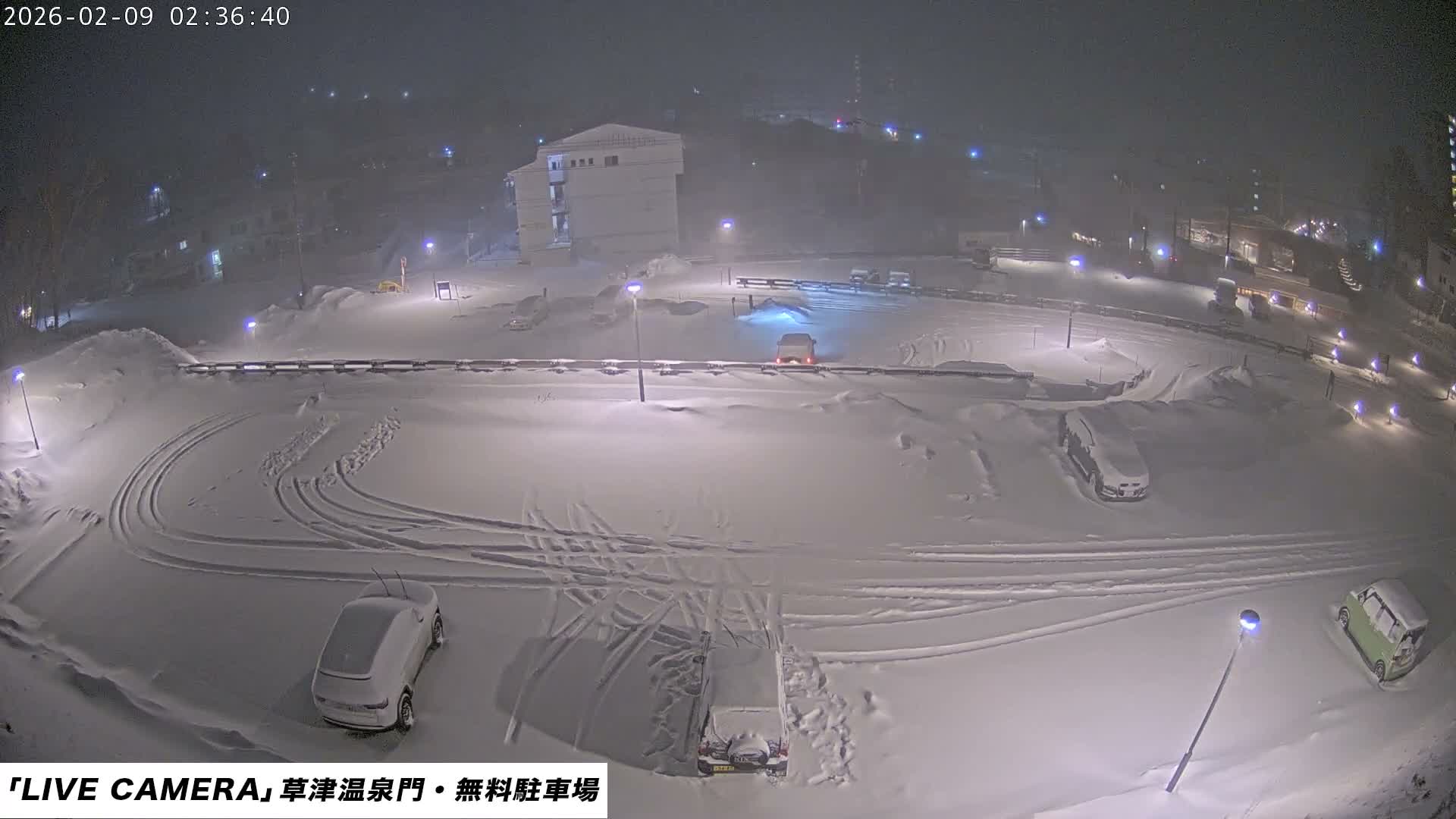 Gunma, Kusatsu Onsen Gate Car Parking Hot Spring Mon Parking Lot & Kusatsu Skyline View towards Northeast ( 群馬県草津温泉門前駐車場と北東方向の草津スカイラインの眺め ) Live Cam  - Kusatsu, Agatsuma-gun , Gunma, Kantō, Honshu, 