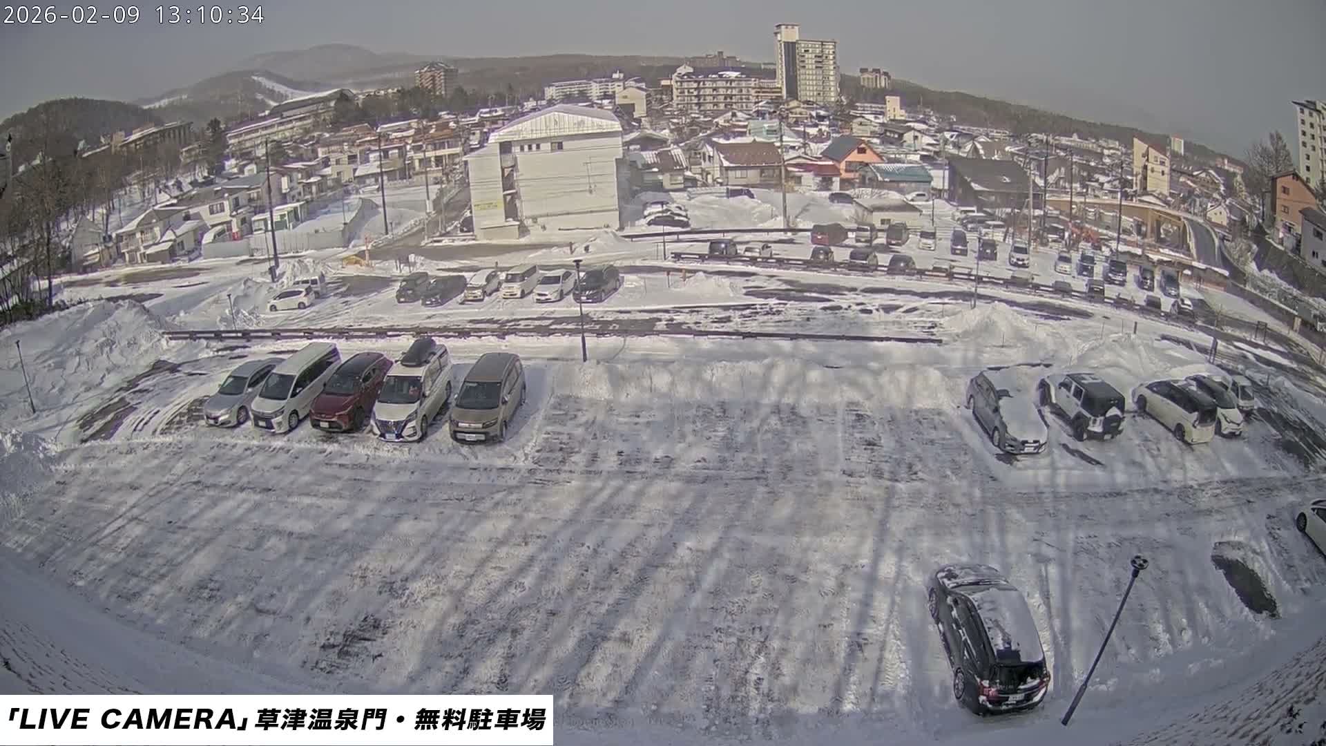 Gunma, Kusatsu Onsen Gate Car Parking Hot Spring Mon Parking Lot & Kusatsu Skyline View towards Northeast ( 群馬県草津温泉門前駐車場と北東方向の草津スカイラインの眺め ) Live Cam  - Kusatsu, Agatsuma-gun , Gunma, Kantō, Honshu, 