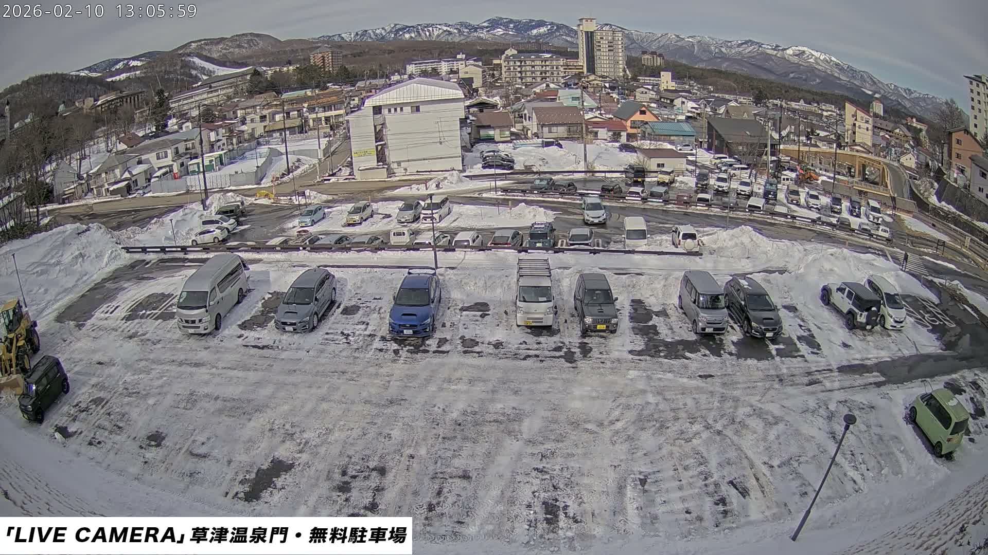 Gunma, Kusatsu Onsen Gate Car Parking Hot Spring Mon Parking Lot & Kusatsu Skyline View towards Northeast ( 群馬県草津温泉門前駐車場と北東方向の草津スカイラインの眺め ) Live Cam  - Kusatsu, Agatsuma-gun , Gunma, Kantō, Honshu, 
