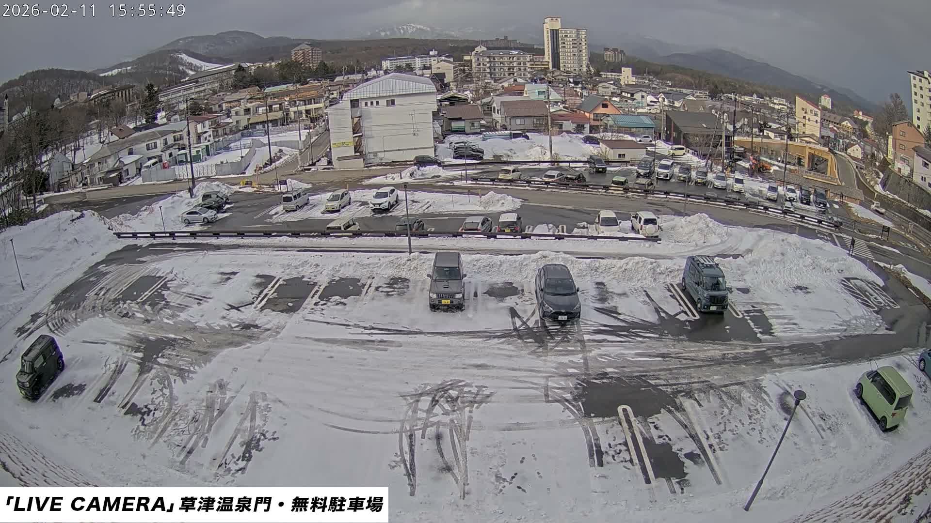 Gunma, Kusatsu Onsen Gate Car Parking Hot Spring Mon Parking Lot & Kusatsu Skyline View towards Northeast ( 群馬県草津温泉門前駐車場と北東方向の草津スカイラインの眺め ) Live Cam  - Kusatsu, Agatsuma-gun , Gunma, Kantō, Honshu, 