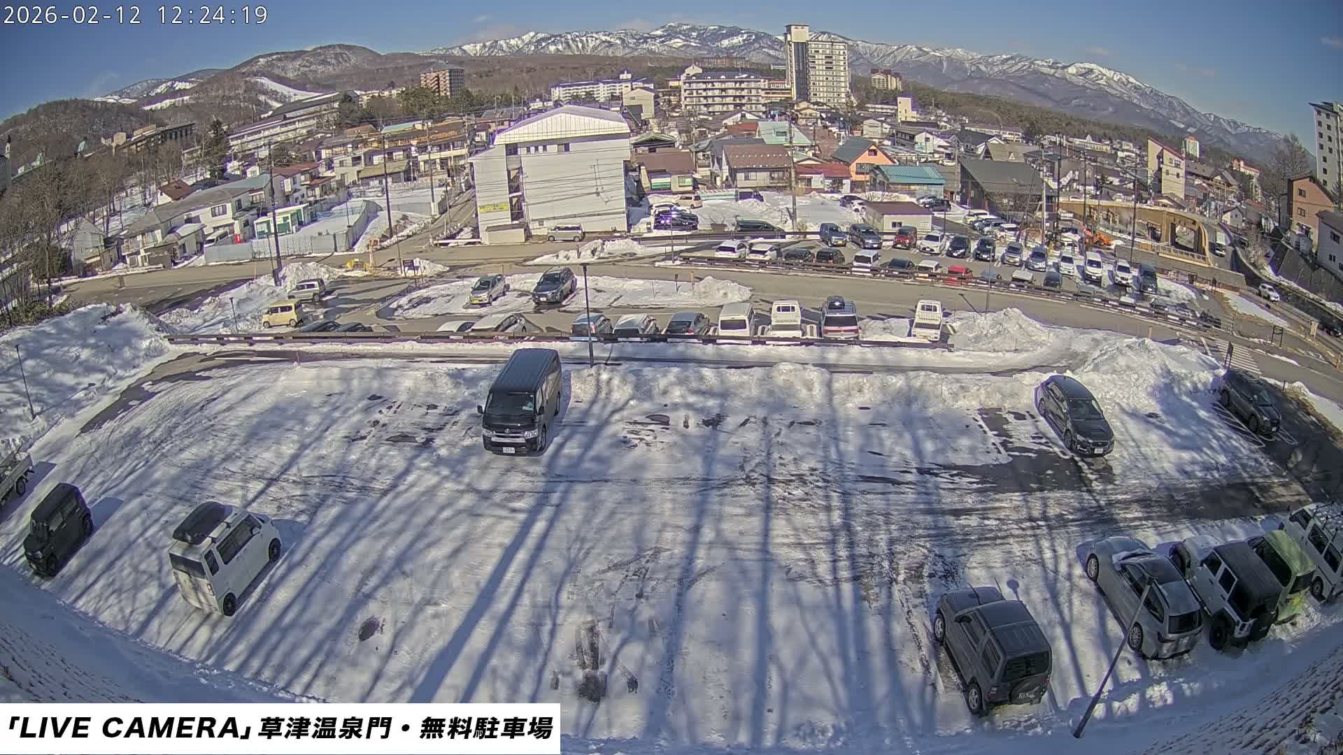 Gunma, Kusatsu Onsen Gate Car Parking Hot Spring Mon Parking Lot & Kusatsu Skyline View towards Northeast ( 群馬県草津温泉門前駐車場と北東方向の草津スカイラインの眺め ) Live Cam  - Kusatsu, Agatsuma-gun , Gunma, Kantō, Honshu, 