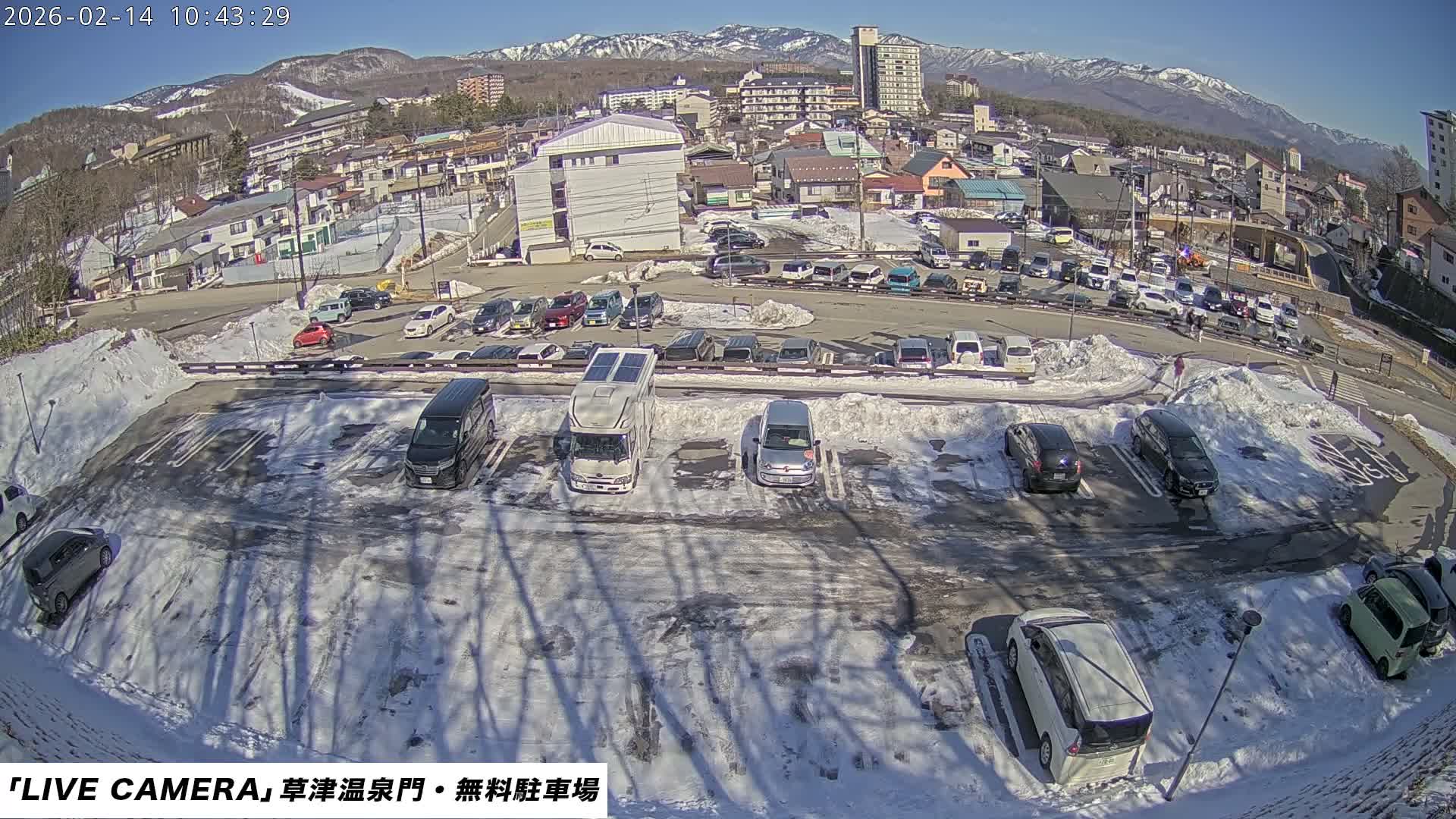 Gunma, Kusatsu Onsen Gate Car Parking Hot Spring Mon Parking Lot & Kusatsu Skyline View towards Northeast ( 群馬県草津温泉門前駐車場と北東方向の草津スカイラインの眺め ) Live Cam  - Kusatsu, Agatsuma-gun , Gunma, Kantō, Honshu, 