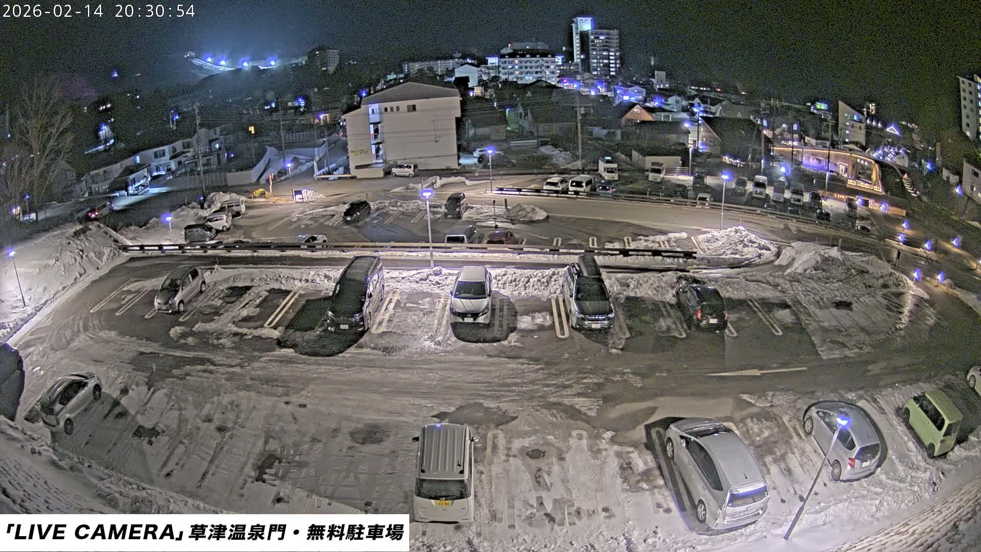 Gunma, Kusatsu Onsen Gate Car Parking Hot Spring Mon Parking Lot & Kusatsu Skyline View towards Northeast ( 群馬県草津温泉門前駐車場と北東方向の草津スカイラインの眺め ) Live Cam  - Kusatsu, Agatsuma-gun , Gunma, Kantō, Honshu, 