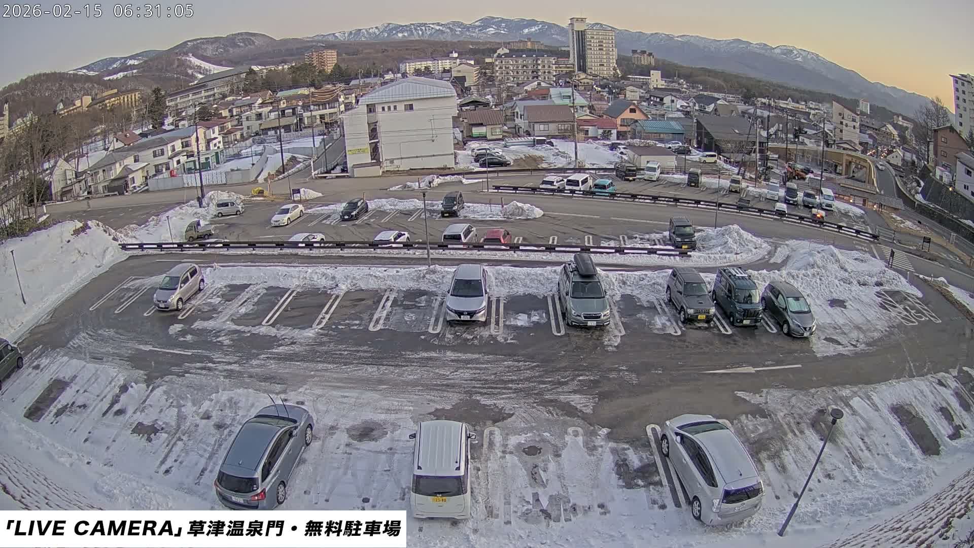 Gunma, Kusatsu Onsen Gate Car Parking Hot Spring Mon Parking Lot & Kusatsu Skyline View towards Northeast ( 群馬県草津温泉門前駐車場と北東方向の草津スカイラインの眺め ) Live Cam  - Kusatsu, Agatsuma-gun , Gunma, Kantō, Honshu, 