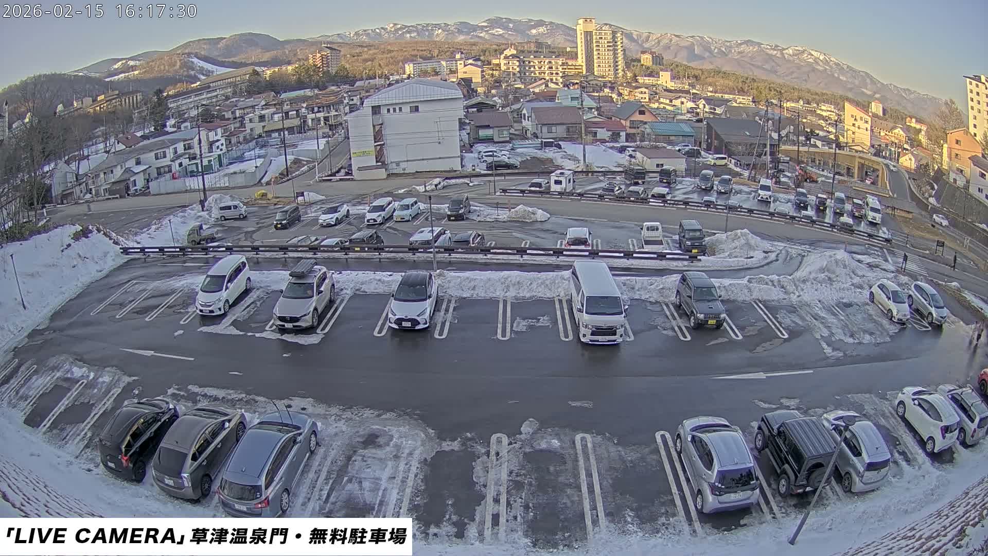 Gunma, Kusatsu Onsen Gate Car Parking Hot Spring Mon Parking Lot & Kusatsu Skyline View towards Northeast ( 群馬県草津温泉門前駐車場と北東方向の草津スカイラインの眺め ) Live Cam  - Kusatsu, Agatsuma-gun , Gunma, Kantō, Honshu, 
