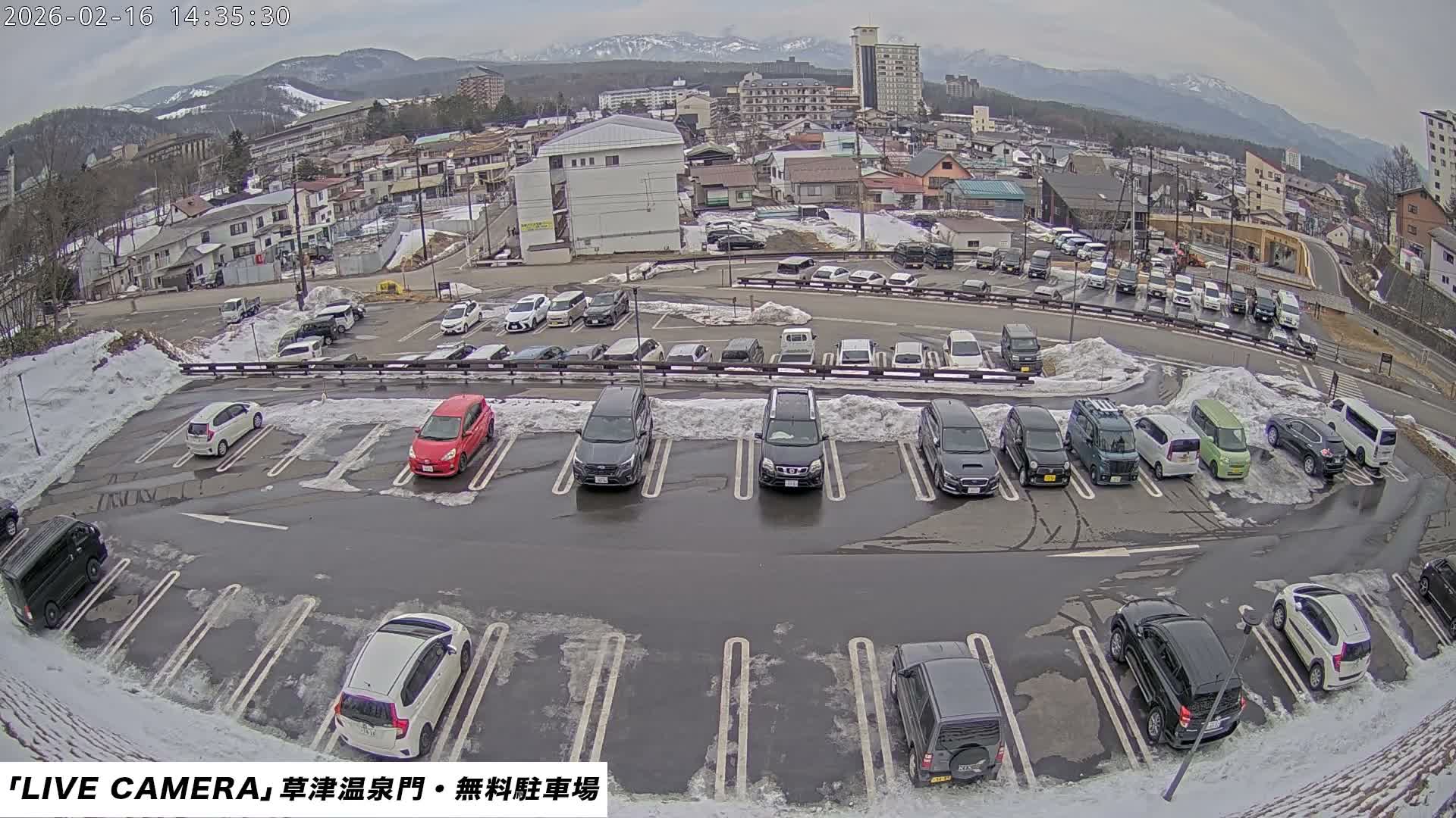 Gunma, Kusatsu Onsen Gate Car Parking Hot Spring Mon Parking Lot & Kusatsu Skyline View towards Northeast ( 群馬県草津温泉門前駐車場と北東方向の草津スカイラインの眺め ) Live Cam  - Kusatsu, Agatsuma-gun , Gunma, Kantō, Honshu, 