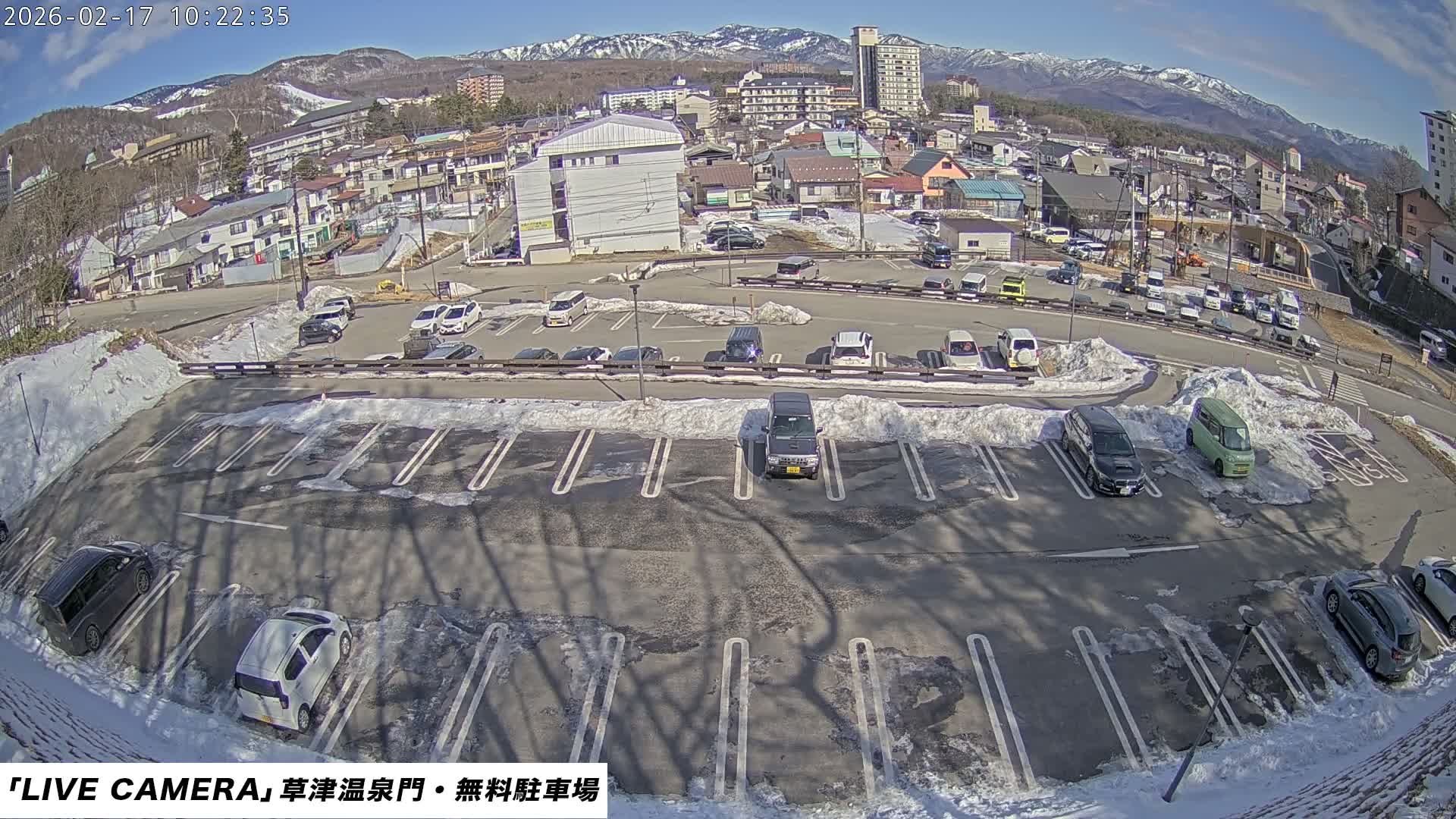 Gunma, Kusatsu Onsen Gate Car Parking Hot Spring Mon Parking Lot & Kusatsu Skyline View towards Northeast ( 群馬県草津温泉門前駐車場と北東方向の草津スカイラインの眺め ) Live Cam  - Kusatsu, Agatsuma-gun , Gunma, Kantō, Honshu, 