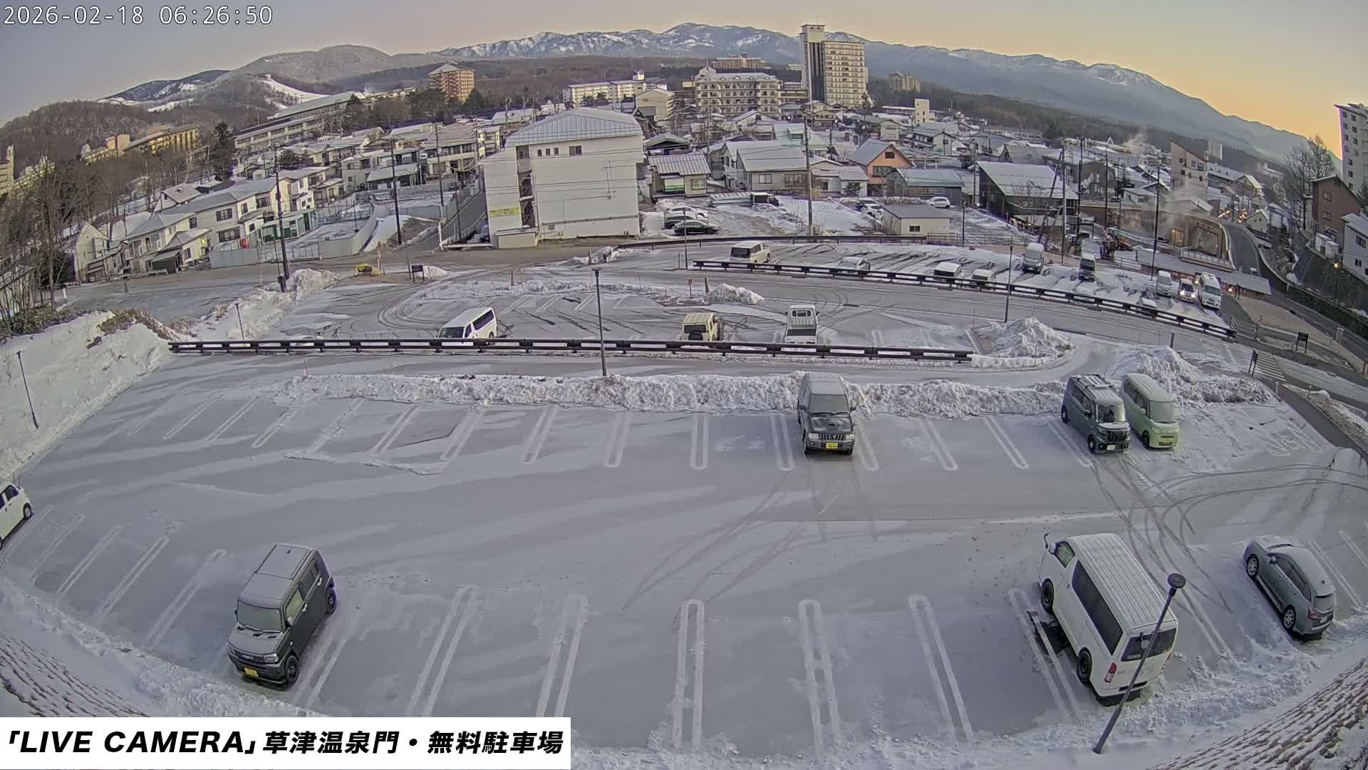 Gunma, Kusatsu Onsen Gate Car Parking Hot Spring Mon Parking Lot & Kusatsu Skyline View towards Northeast ( 群馬県草津温泉門前駐車場と北東方向の草津スカイラインの眺め ) Live Cam  - Kusatsu, Agatsuma-gun , Gunma, Kantō, Honshu, 