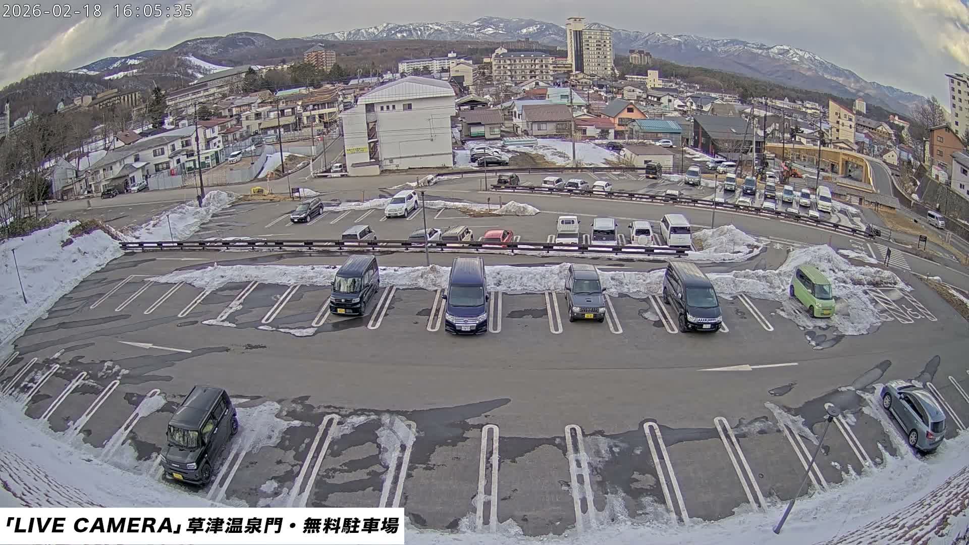 Gunma, Kusatsu Onsen Gate Car Parking Hot Spring Mon Parking Lot & Kusatsu Skyline View towards Northeast ( 群馬県草津温泉門前駐車場と北東方向の草津スカイラインの眺め ) Live Cam  - Kusatsu, Agatsuma-gun , Gunma, Kantō, Honshu, 