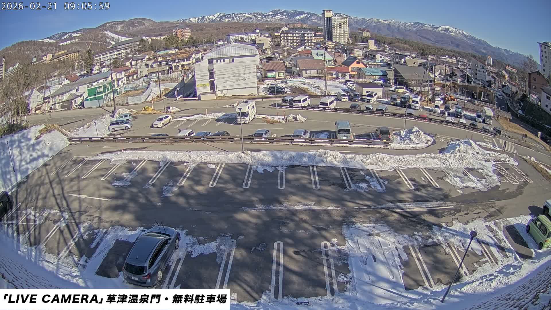 Gunma, Kusatsu Onsen Gate Car Parking Hot Spring Mon Parking Lot & Kusatsu Skyline View towards Northeast ( 群馬県草津温泉門前駐車場と北東方向の草津スカイラインの眺め ) Live Cam  - Kusatsu, Agatsuma-gun , Gunma, Kantō, Honshu, 