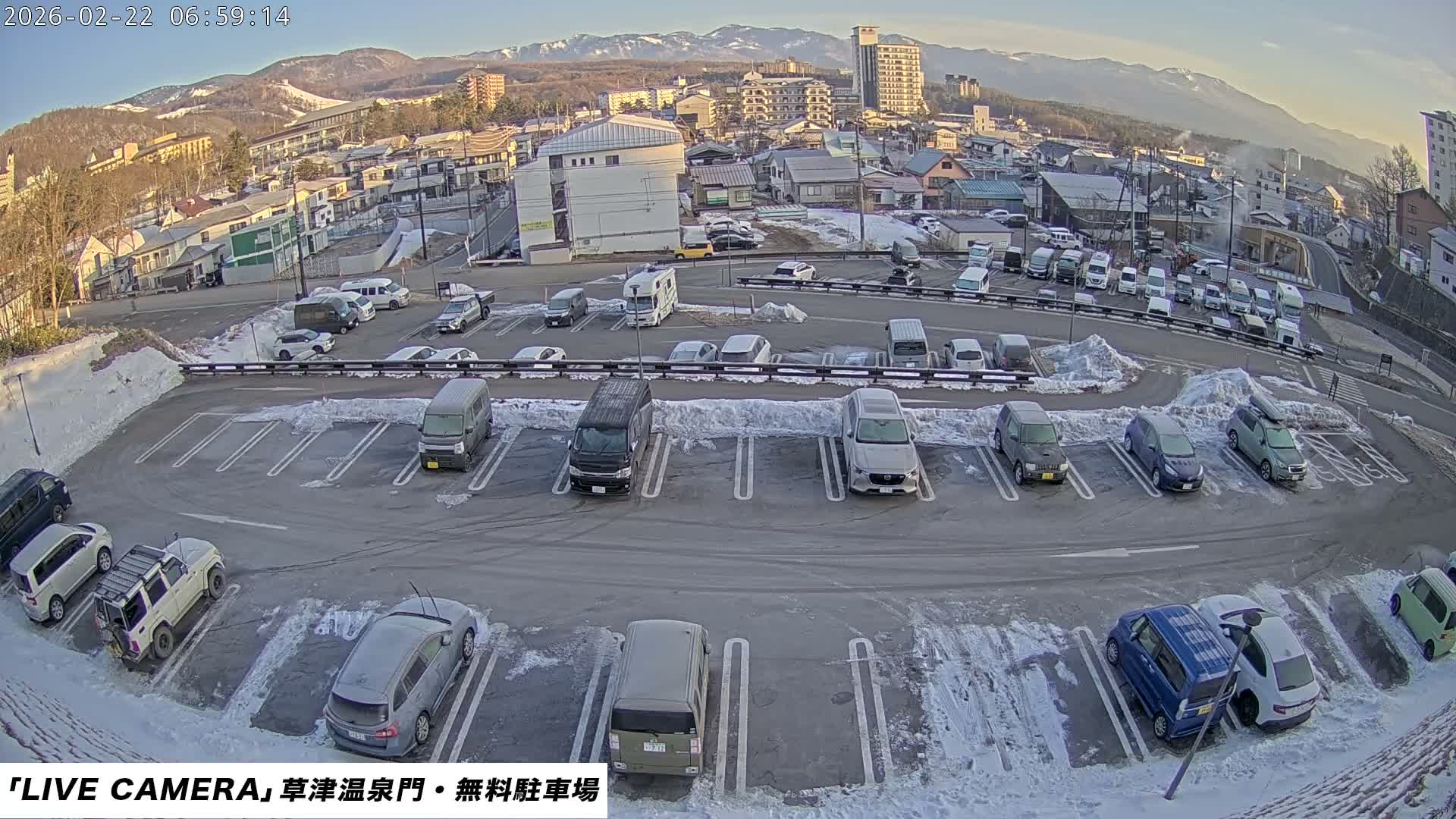Gunma, Kusatsu Onsen Gate Car Parking Hot Spring Mon Parking Lot & Kusatsu Skyline View towards Northeast ( 群馬県草津温泉門前駐車場と北東方向の草津スカイラインの眺め ) Live Cam  - Kusatsu, Agatsuma-gun , Gunma, Kantō, Honshu, 