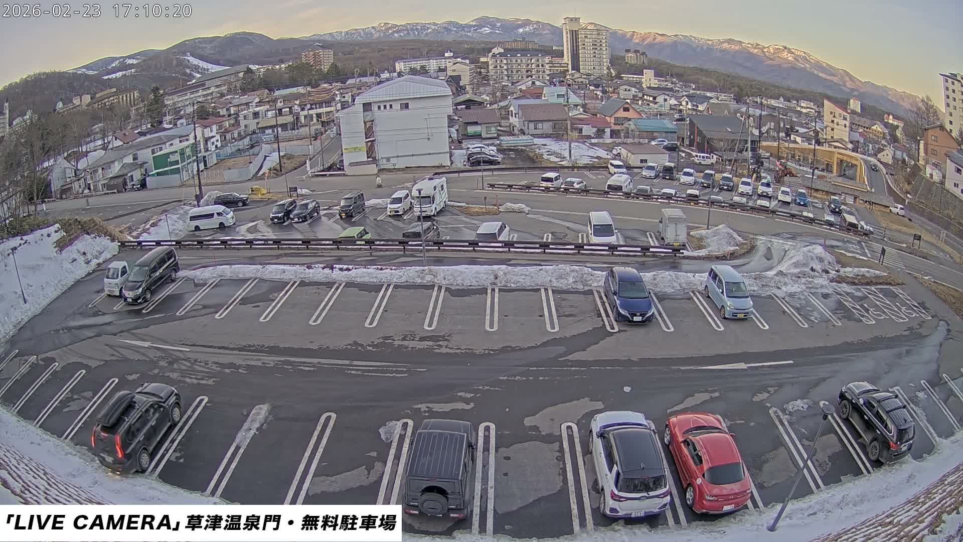 Gunma, Kusatsu Onsen Gate Car Parking Hot Spring Mon Parking Lot & Kusatsu Skyline View towards Northeast ( 群馬県草津温泉門前駐車場と北東方向の草津スカイラインの眺め ) Live Cam  - Kusatsu, Agatsuma-gun , Gunma, Kantō, Honshu, 