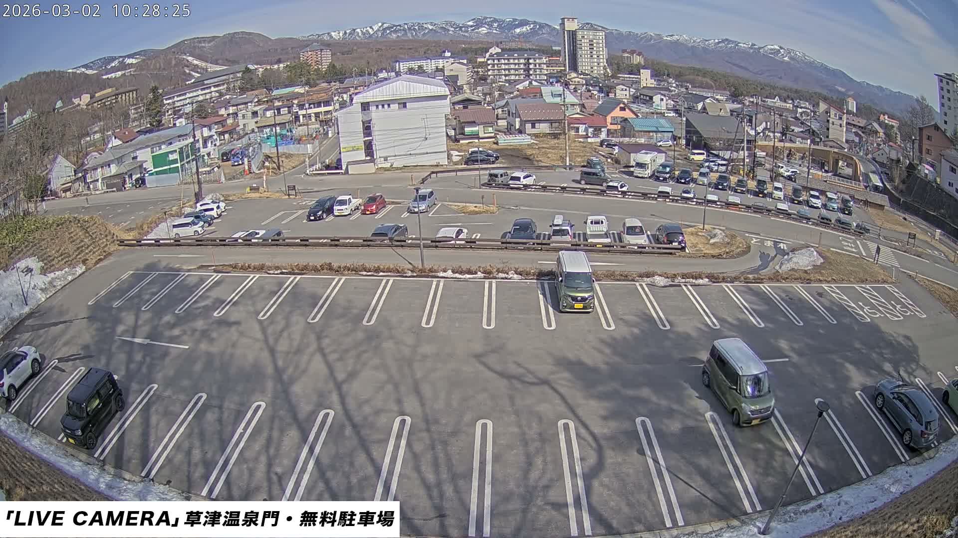 Gunma, Kusatsu Onsen Gate Car Parking Hot Spring Mon Parking Lot & Kusatsu Skyline View towards Northeast ( 群馬県草津温泉門前駐車場と北東方向の草津スカイラインの眺め ) Live Cam  - Kusatsu, Agatsuma-gun , Gunma, Kantō, Honshu, 